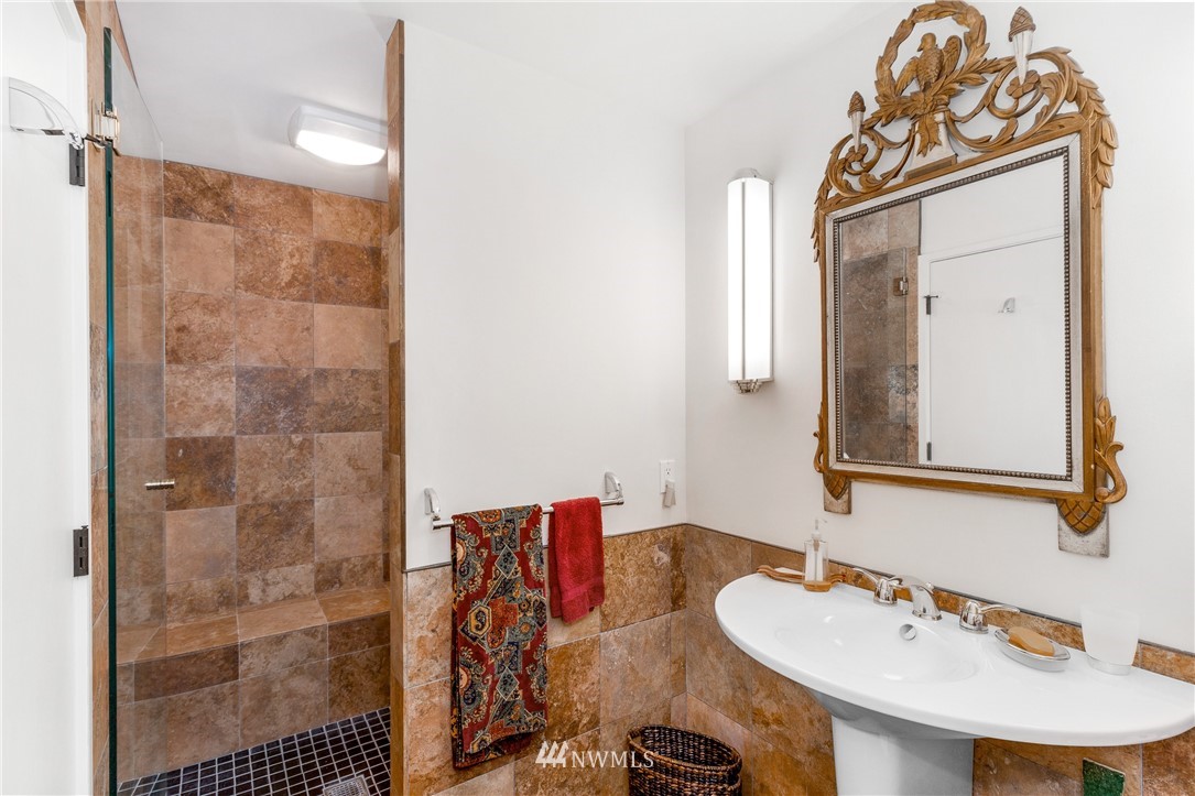 184 Armadale Road, Unit 5 Friday Harbor, WA 98250 - Photo 16 of 23 a bathroom with a sink vanity and a mirror
