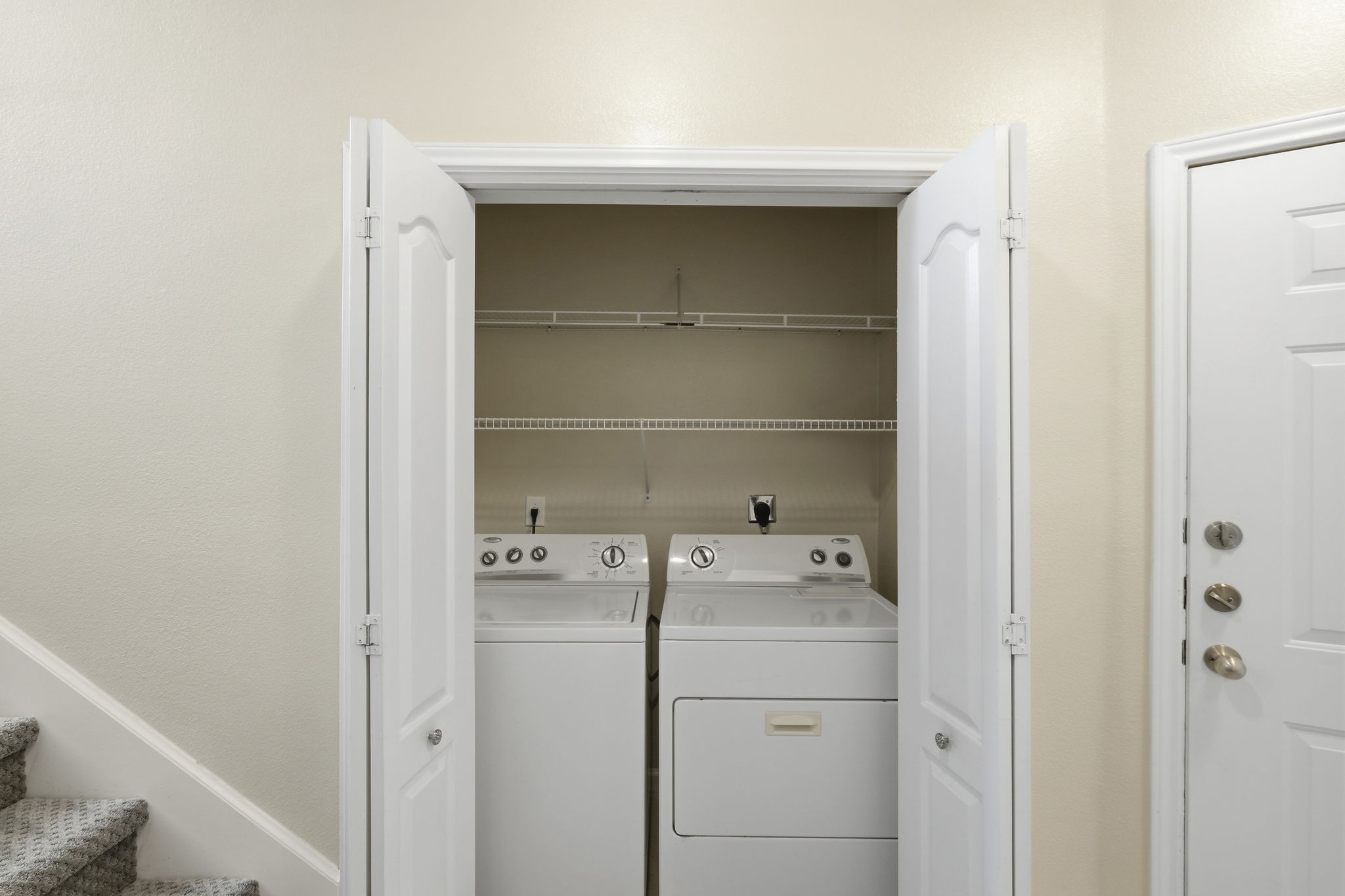 11203 Ranch Road 2222, Unit 2305 Austin, TX 78732 - Photo 13 of 19 Laundry area with washer and clothes dryer