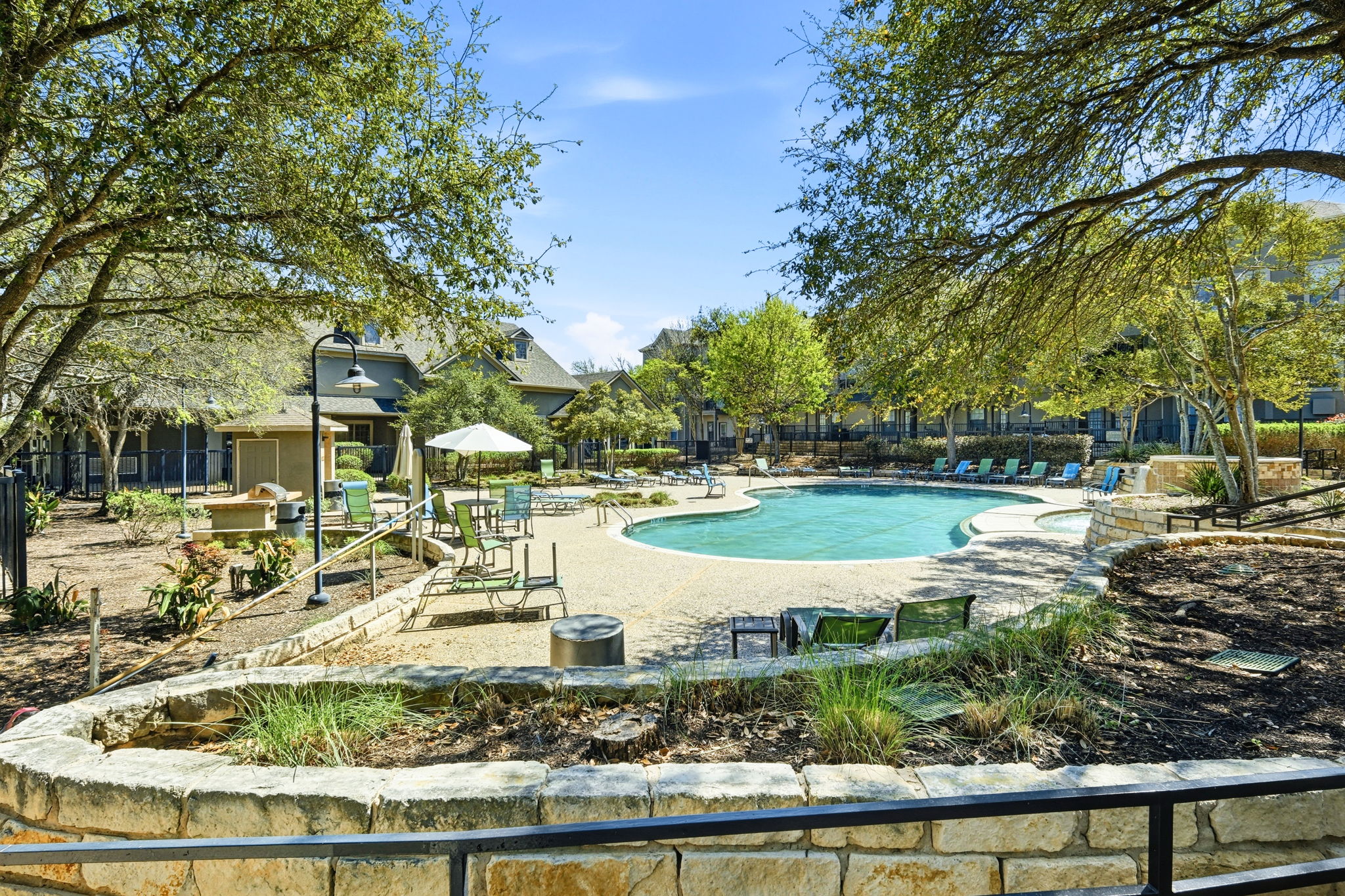 11203 Ranch Road 2222, Unit 2305 Austin, TX 78732 - Photo 15 of 19 Community pool featuring a patio area