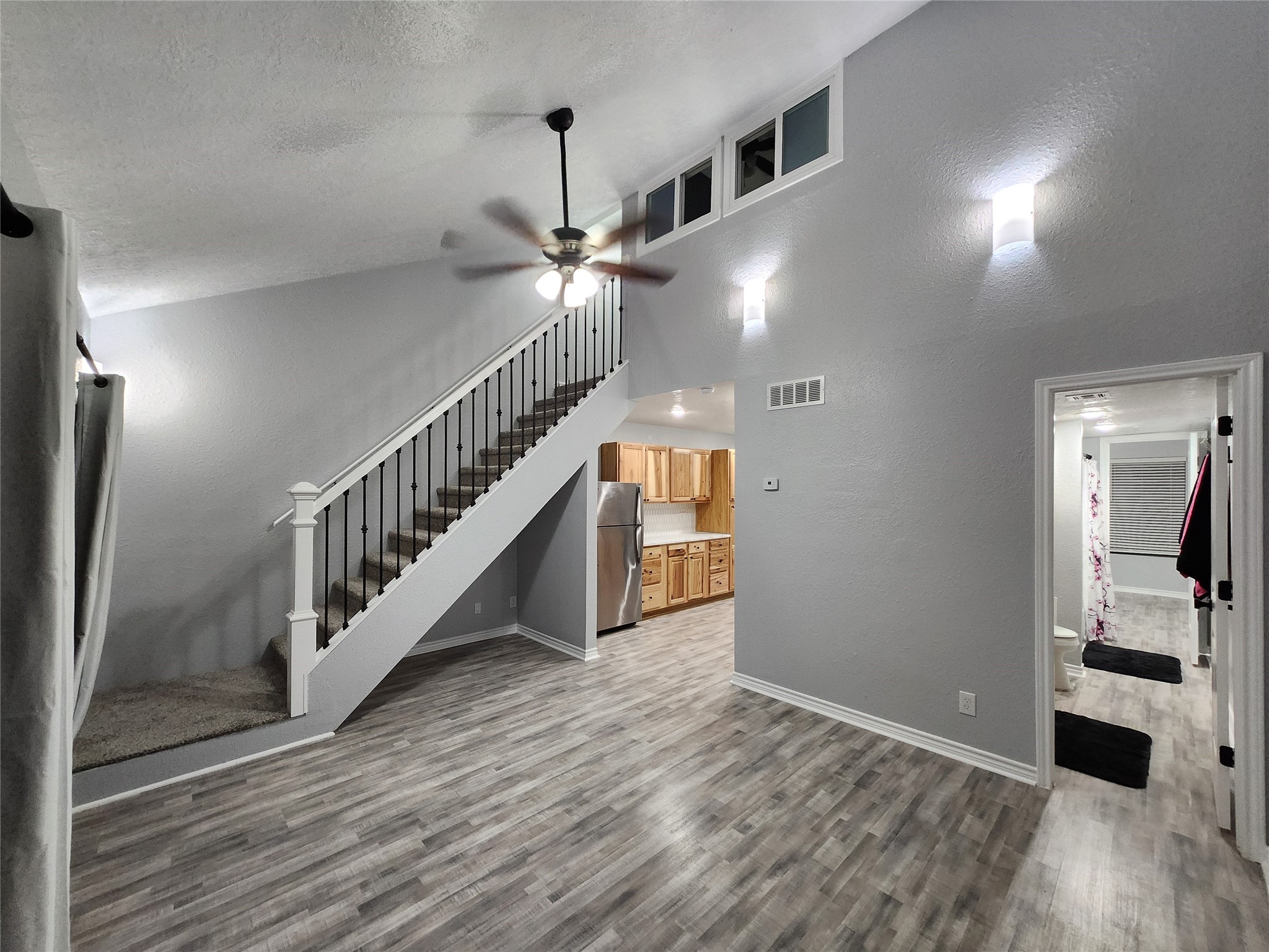 12900 Walden Road, Unit 314C Montgomery, TX 77356 - Photo 11 of 20 a view of entryway and hall with wooden floor
