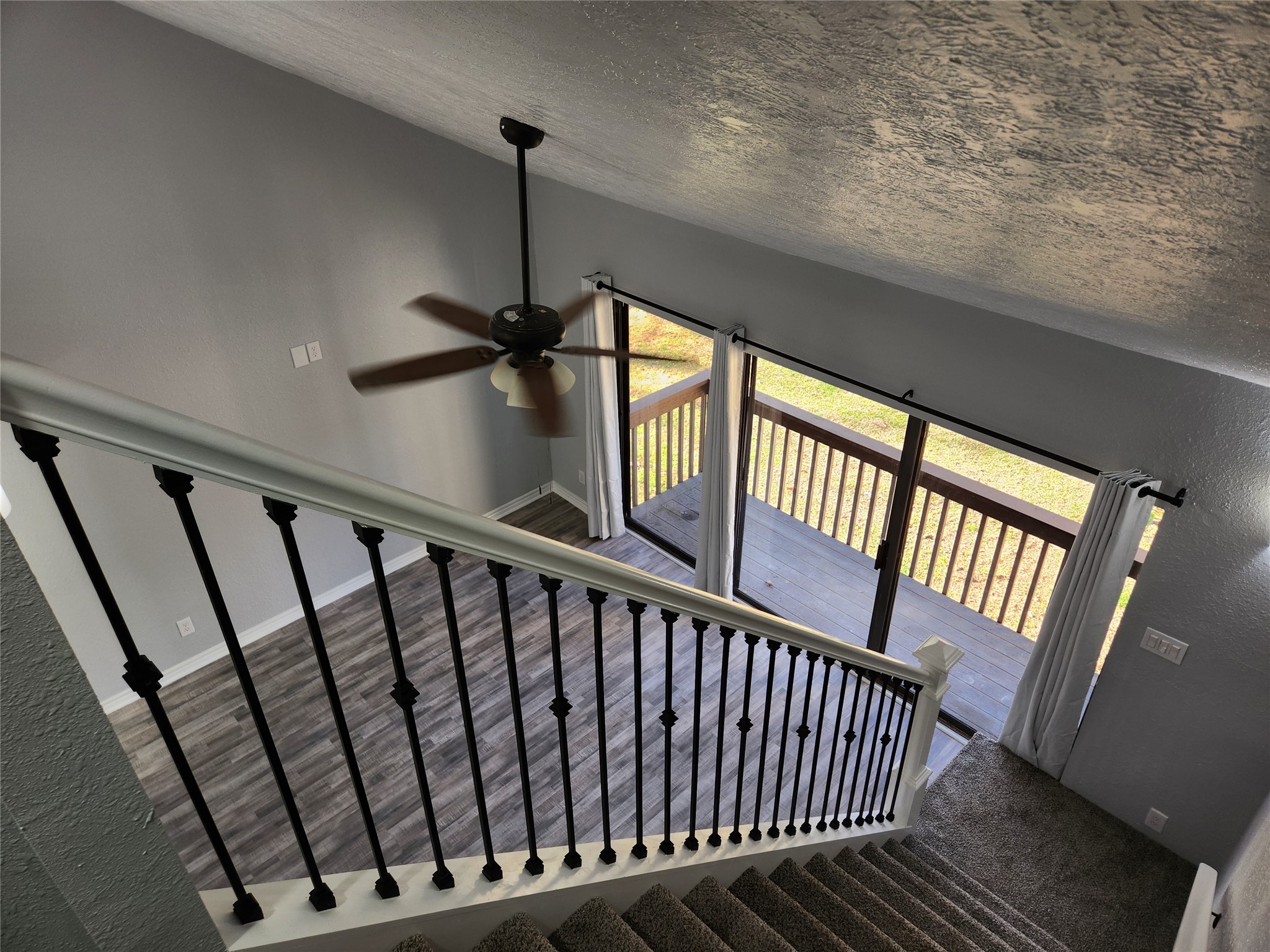 12900 Walden Road, Unit 314C Montgomery, TX 77356 - Photo 13 of 20 a view of staircase with wooden floor and white walls