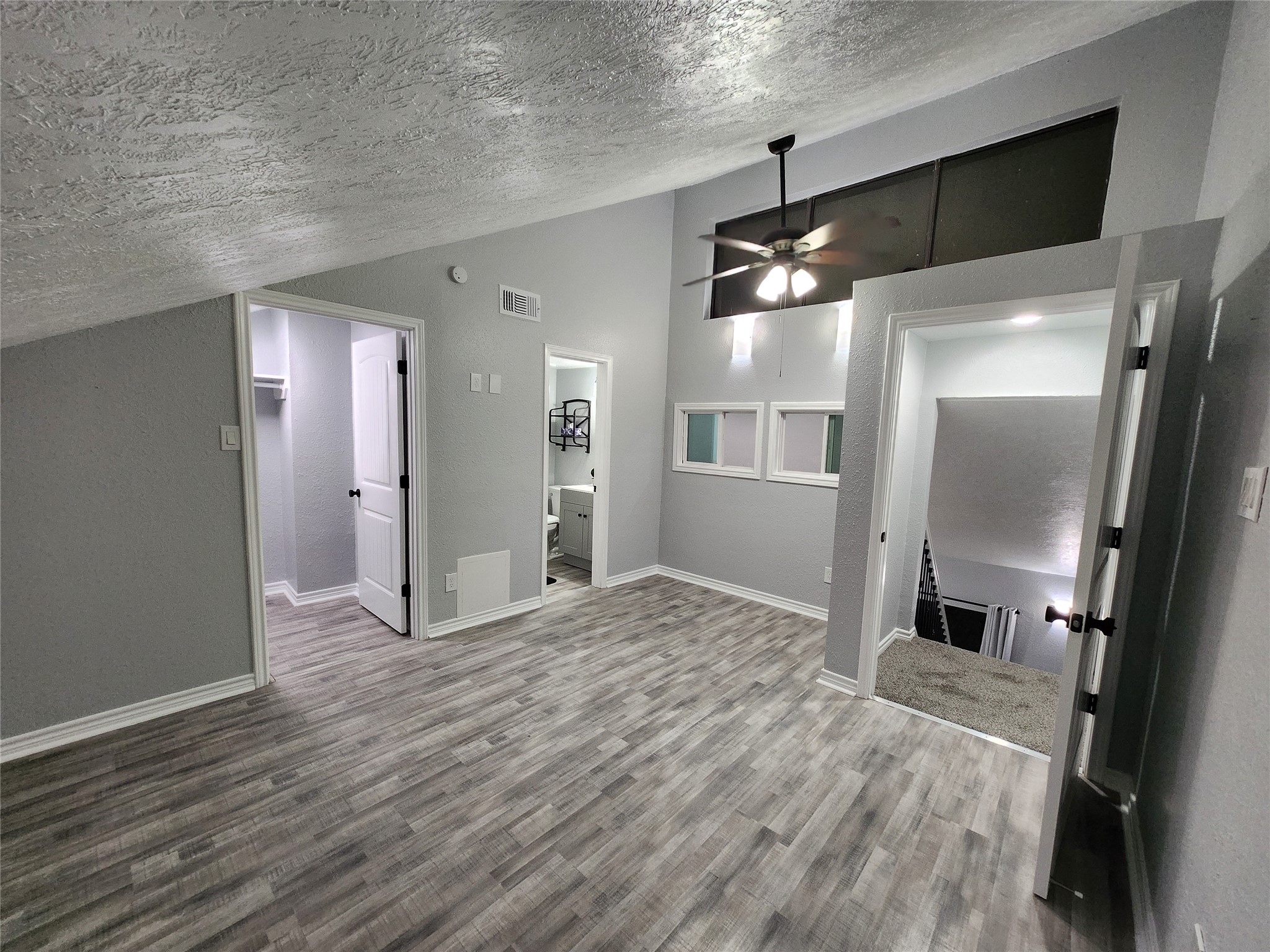 12900 Walden Road, Unit 314C Montgomery, TX 77356 - Photo 14 of 20 a view of a kitchen with a sink and refrigerator