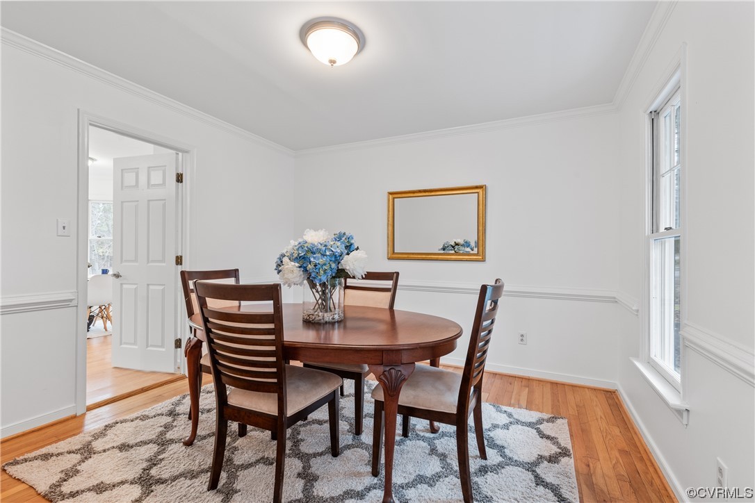 14804 Acorn Ridge Place Midlothian, VA 23112 - Photo 9 of 42 a dining room with furniture and wooden floor