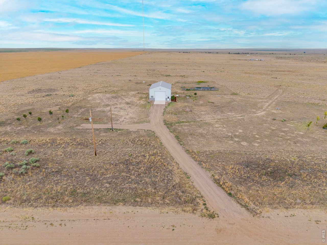 13550 Deter-Winters Road Byers, CO 80103 - Photo 4 of 50 A compacted road base driveway leads you to the barn along with 2 RV pads for friends, family and other guests to use while visiting