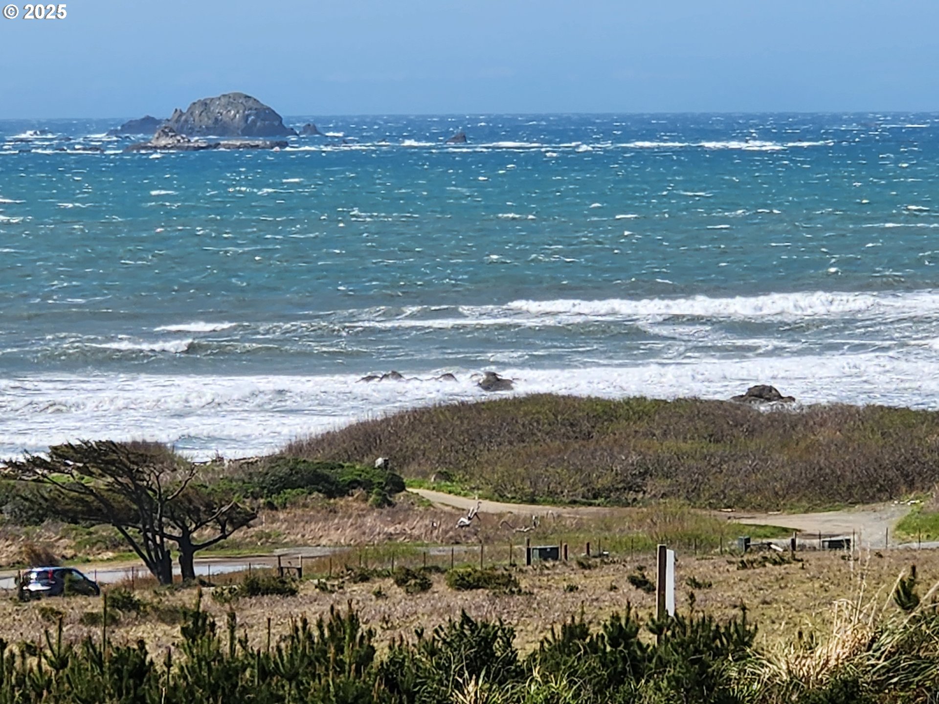 30420 Sawyer Way Gold Beach, OR 97444 - Photo 2 of 47 a view of an ocean and a beach