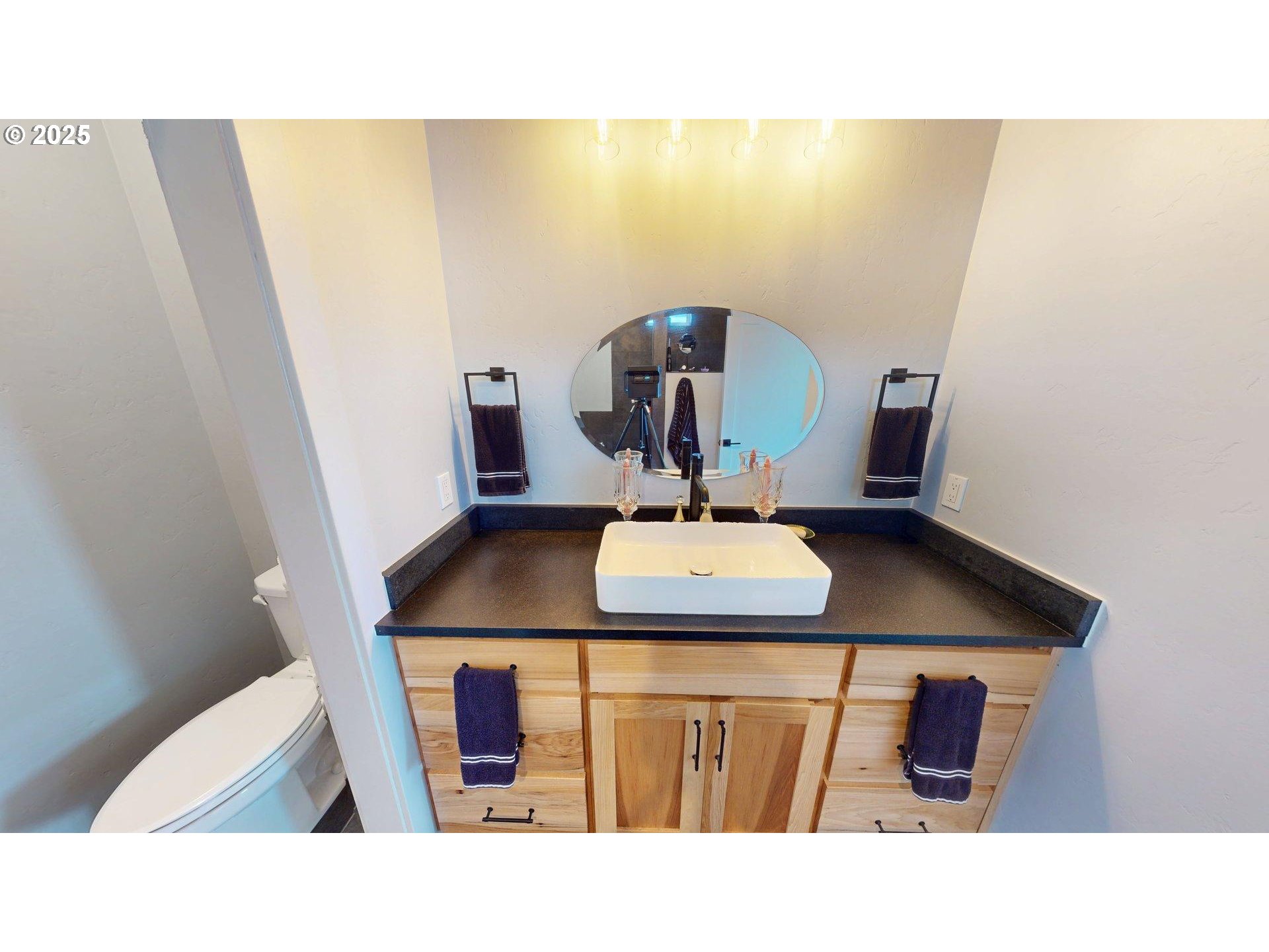 30420 Sawyer Way Gold Beach, OR 97444 - Photo 21 of 47 a bathroom with a sink and a mirror