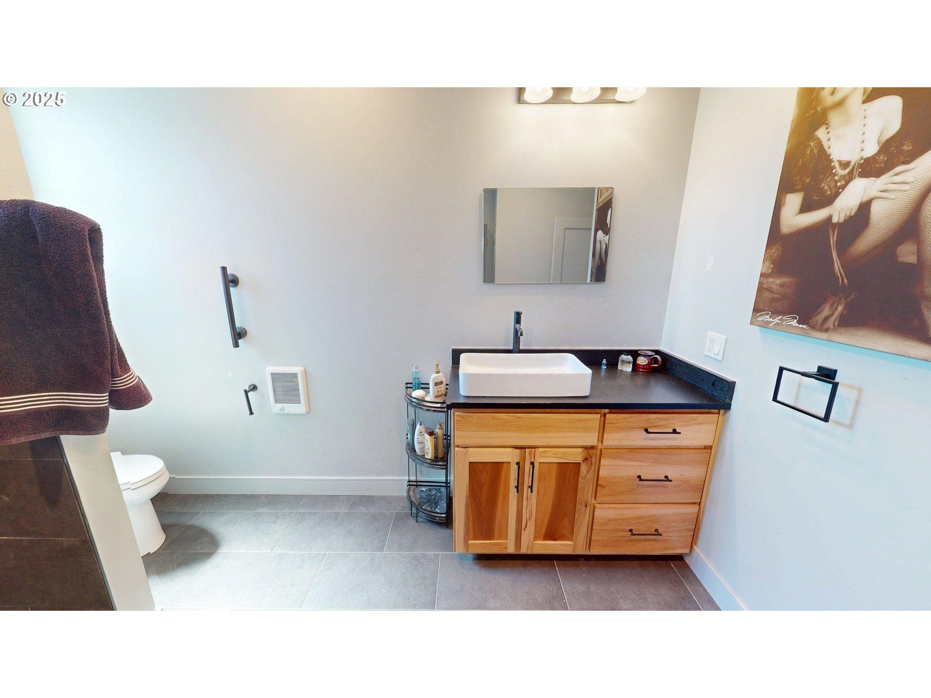 30420 Sawyer Way Gold Beach, OR 97444 - Photo 24 of 47 a bathroom with a sink and a mirror