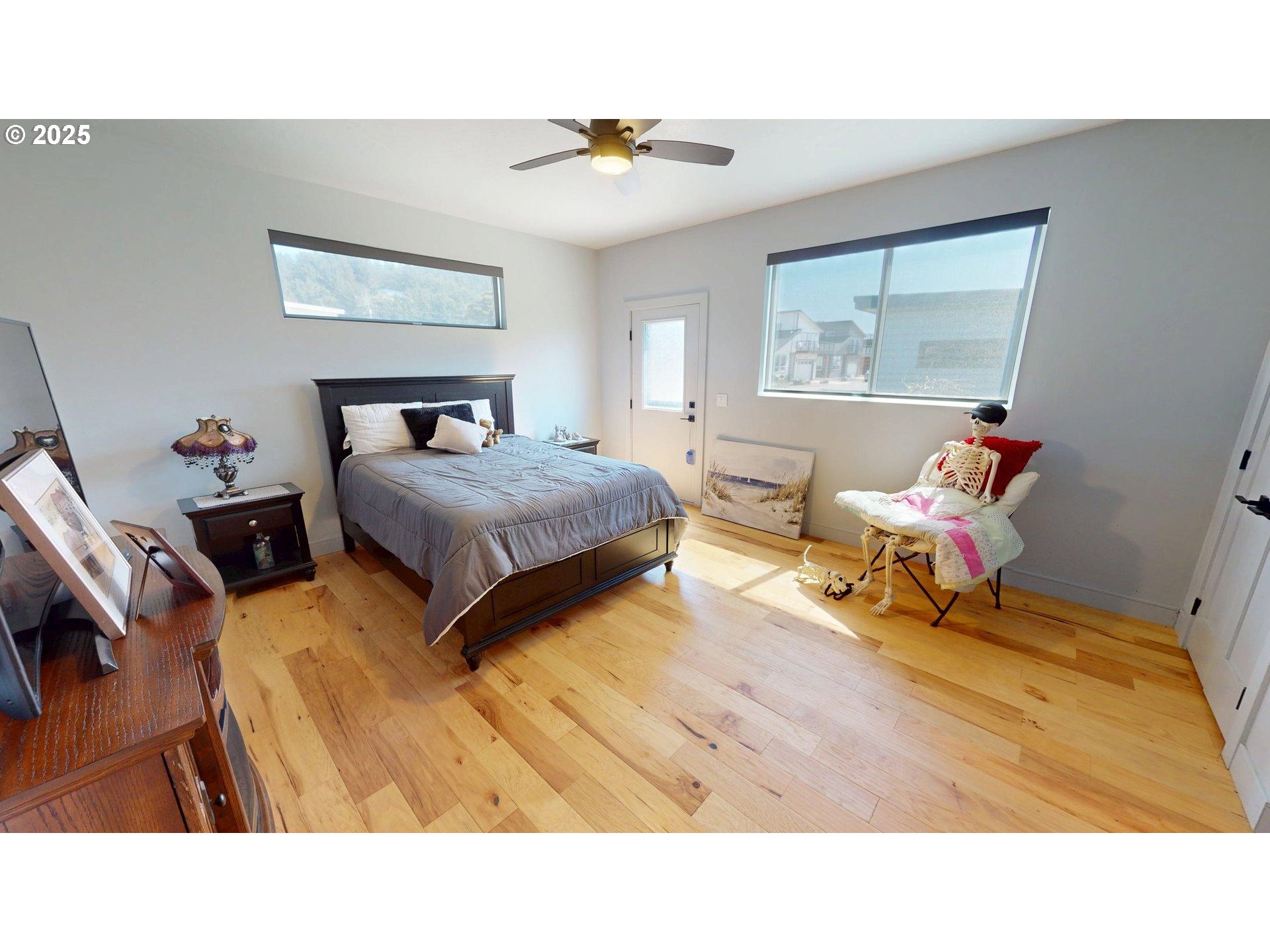 30420 Sawyer Way Gold Beach, OR 97444 - Photo 29 of 47 a living room with a bed furniture and a window
