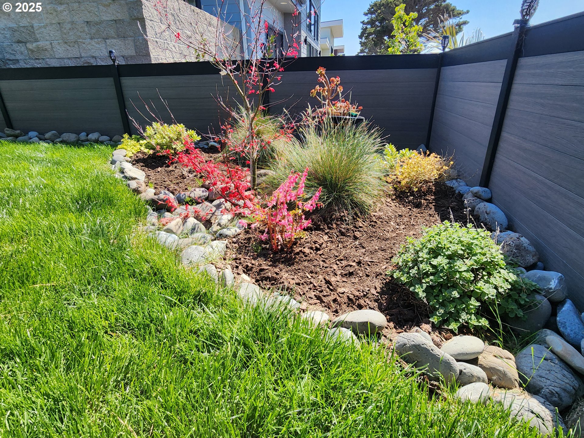 30420 Sawyer Way Gold Beach, OR 97444 - Photo 35 of 47 a view of a flower in a garden