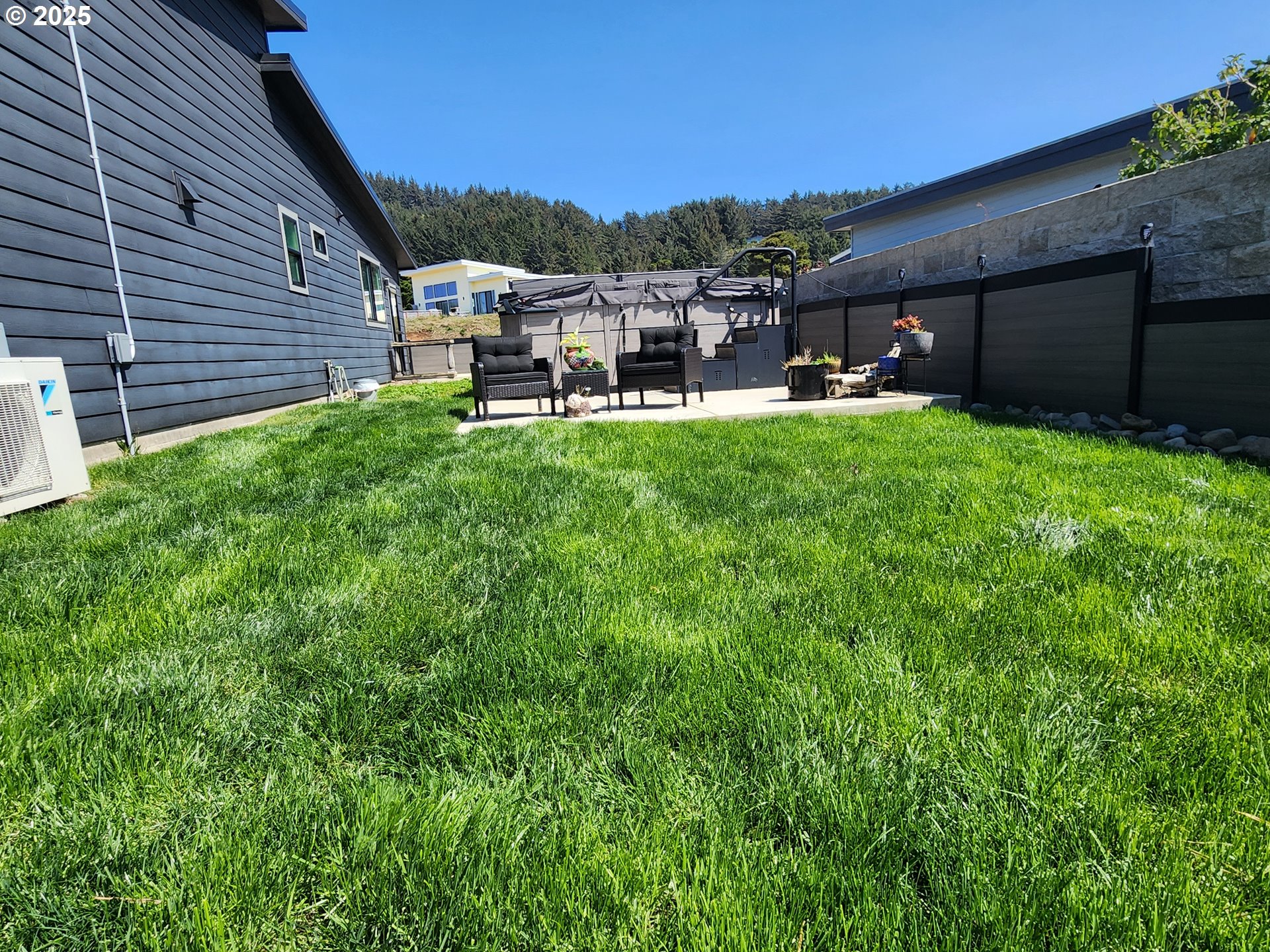 30420 Sawyer Way Gold Beach, OR 97444 - Photo 36 of 47 a view of a house with a backyard