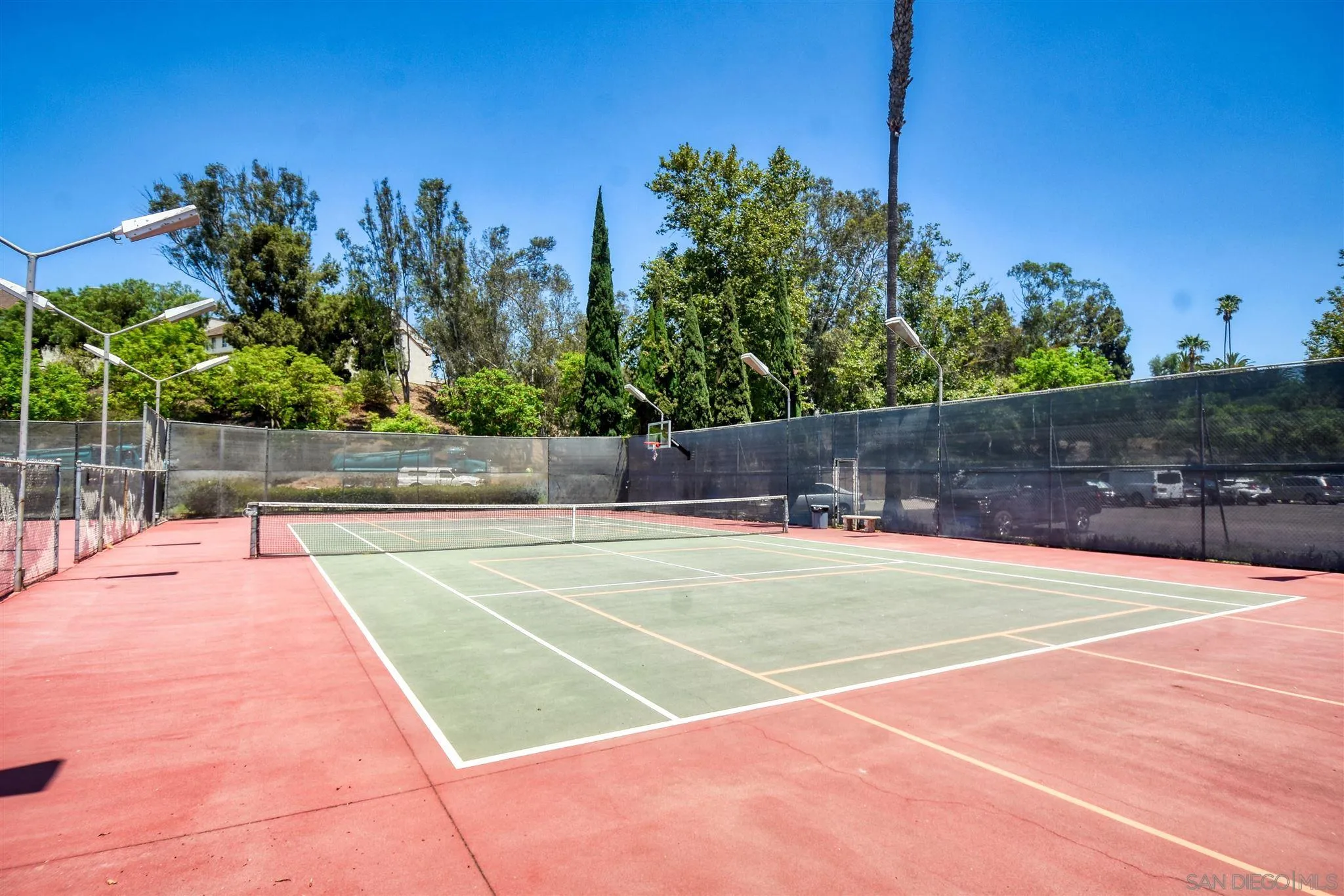 6069 Rancho Mission Road, Unit 202 San Diego, CA 92108 - Photo 24 of 26 a view of a tennis court