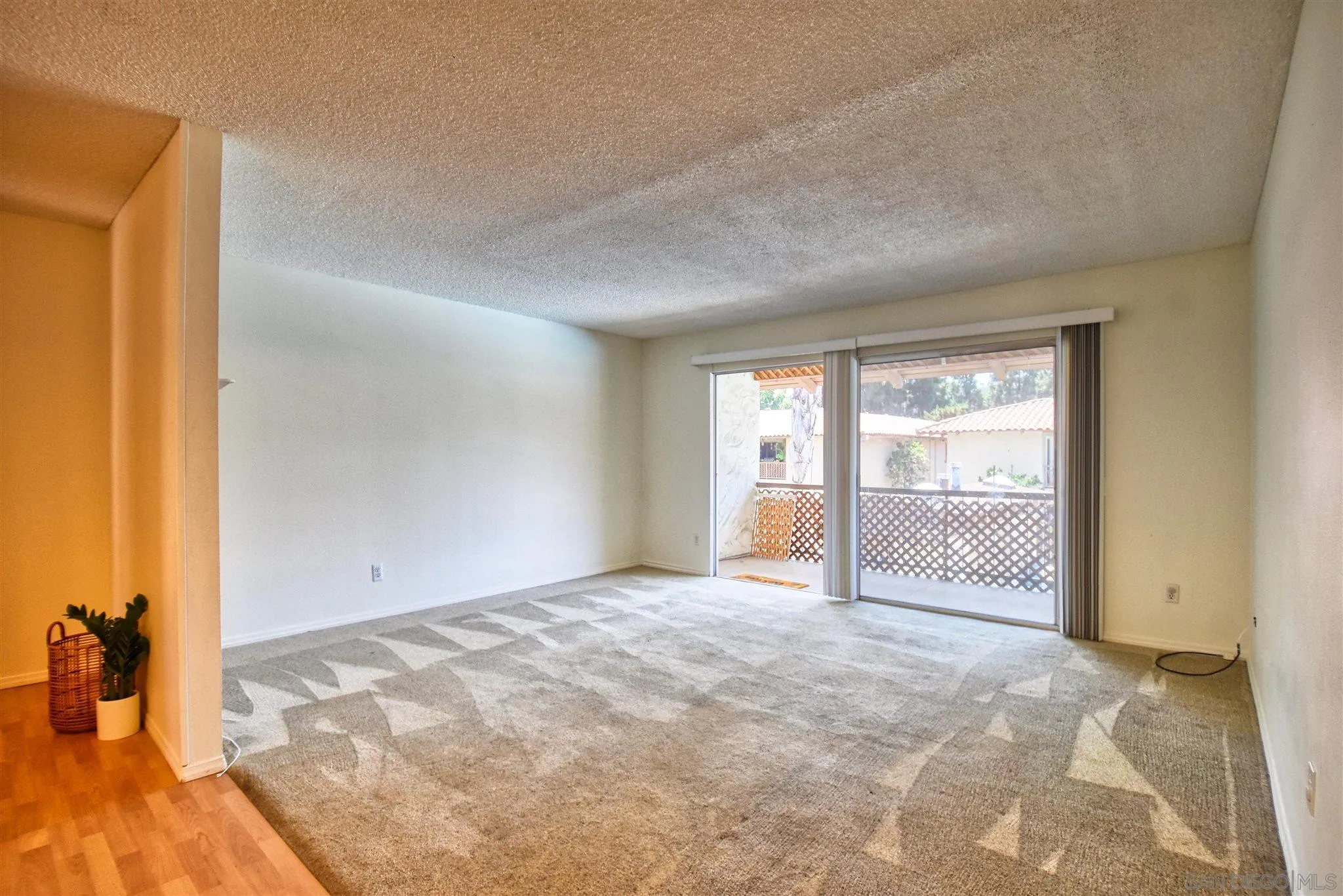 6069 Rancho Mission Road, Unit 202 San Diego, CA 92108 - Photo 6 of 26 a view of an empty room and window