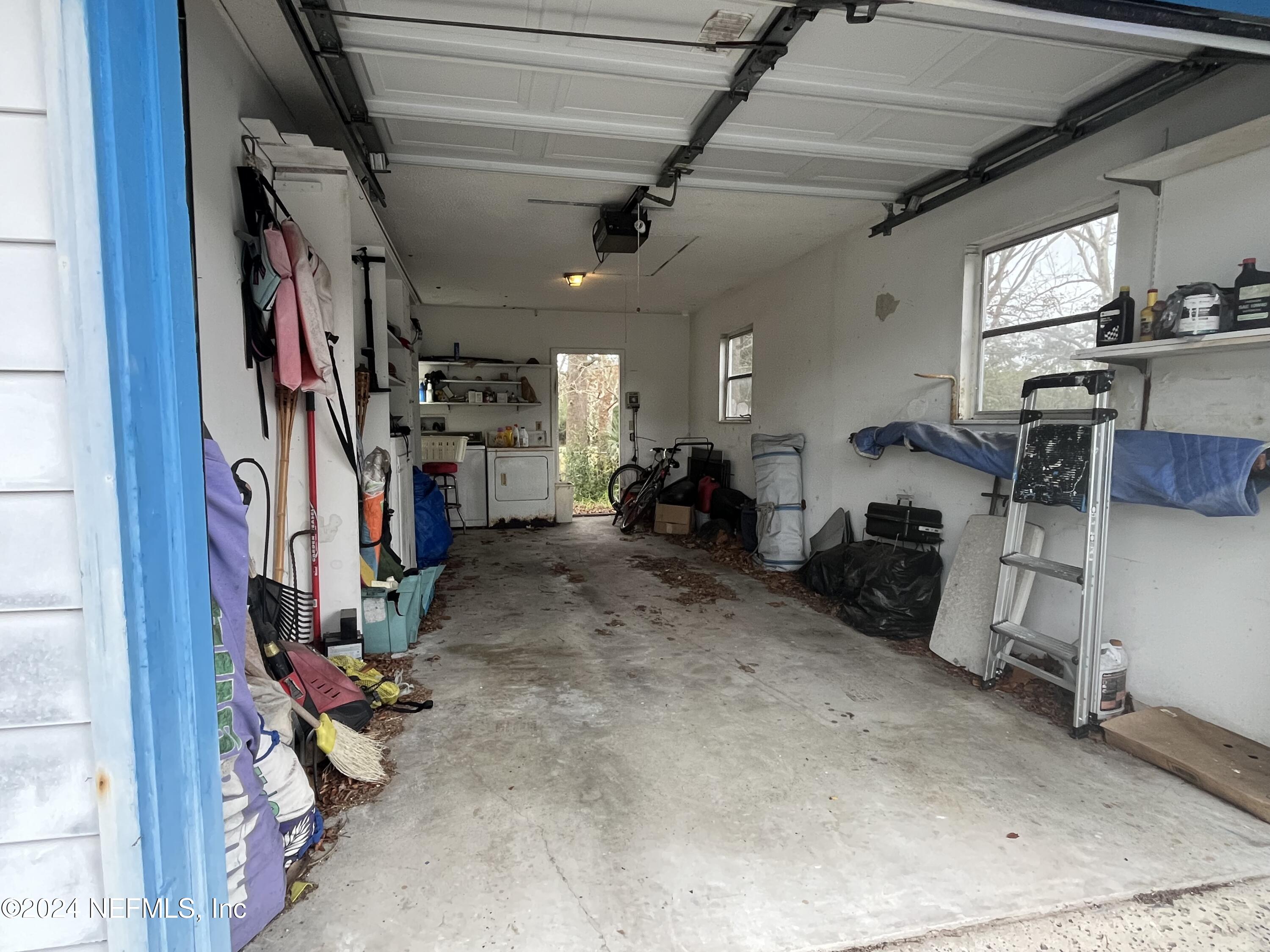 228 Lily Road St. Augustine, FL 32086 - Photo 27 of 34 a view of a room with gym equipment