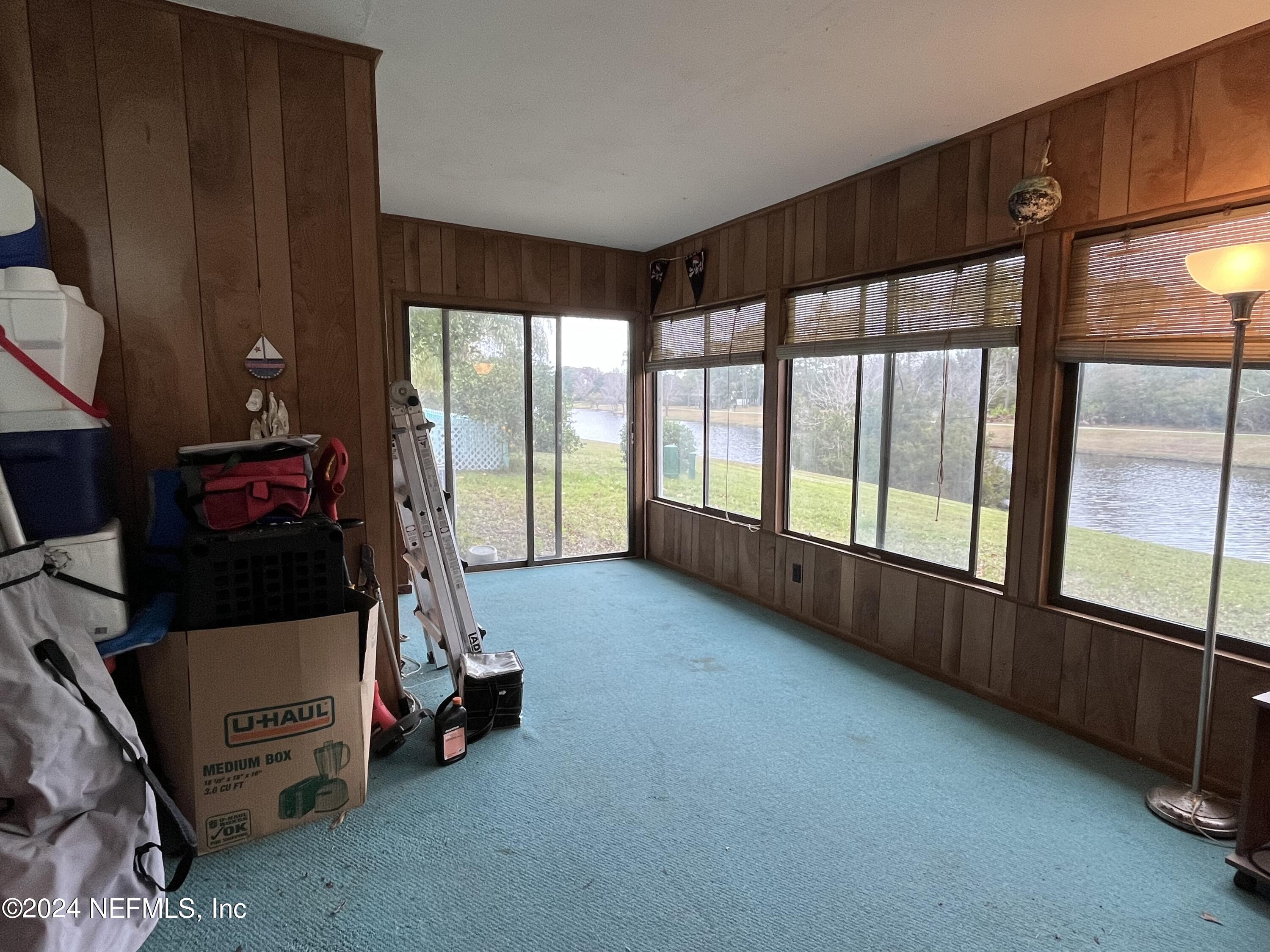 228 Lily Road St. Augustine, FL 32086 - Photo 29 of 34 a view of a room with gym equipment