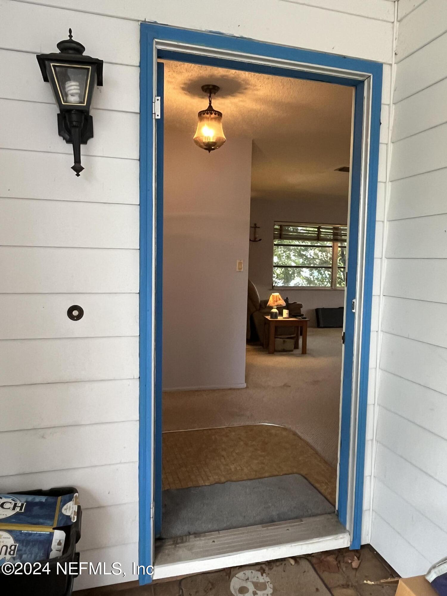 228 Lily Road St. Augustine, FL 32086 - Photo 3 of 34 a view of front door