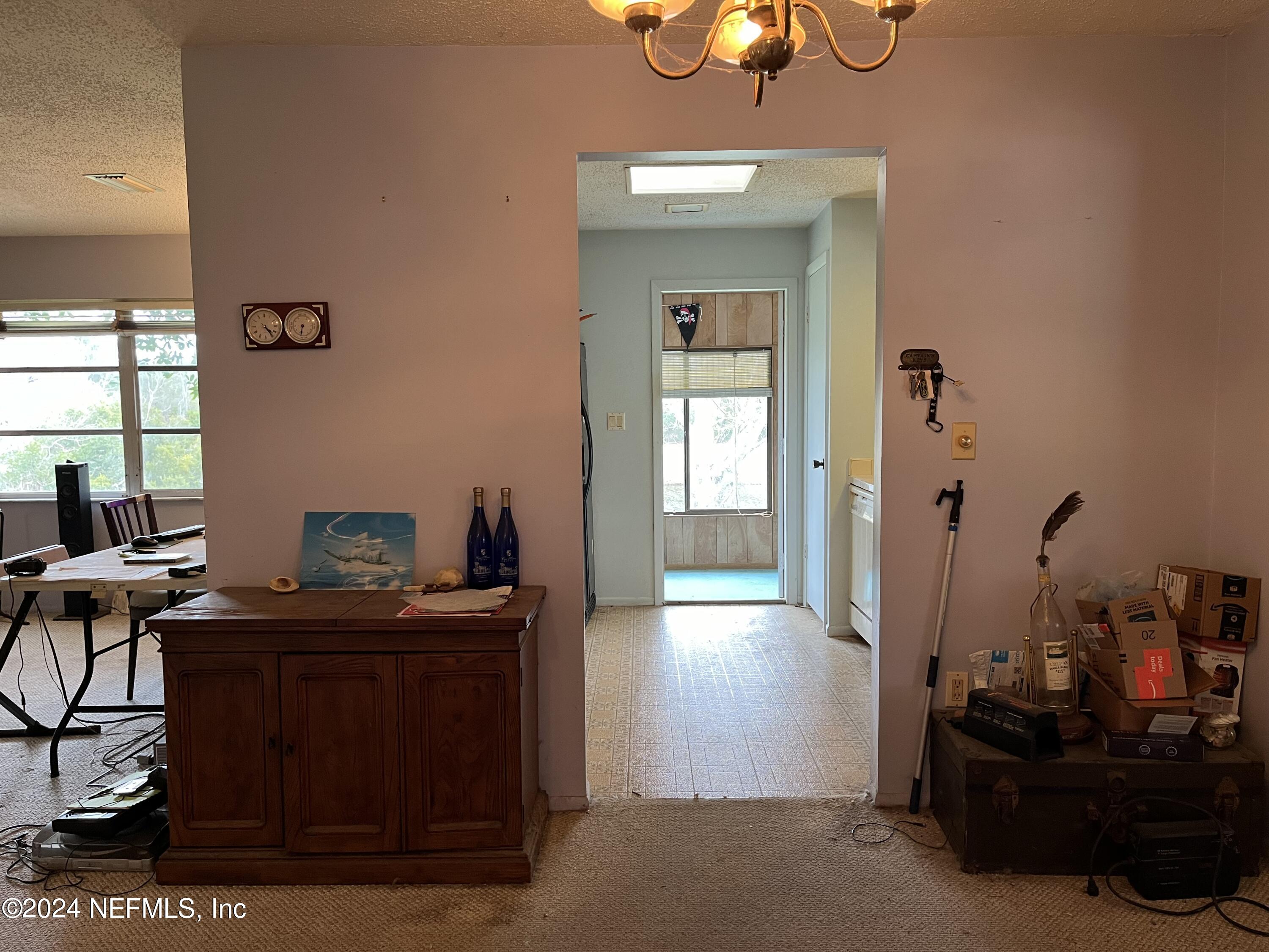 228 Lily Road St. Augustine, FL 32086 - Photo 8 of 34 a view of a workspace with furniture