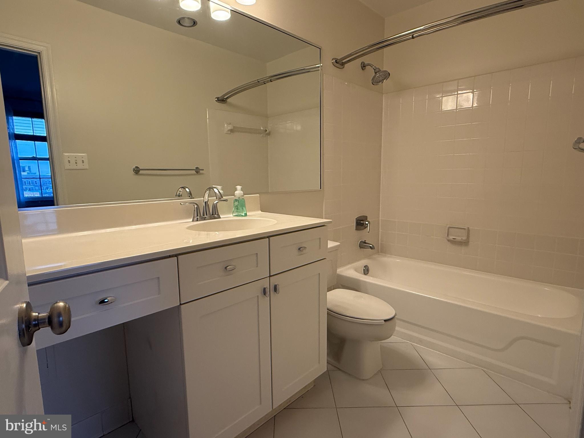 1632 Beekman Place Northwest, Unit B Washington, DC 20009 - Photo 12 of 14 Bright and airy bathroom with modern finishes.