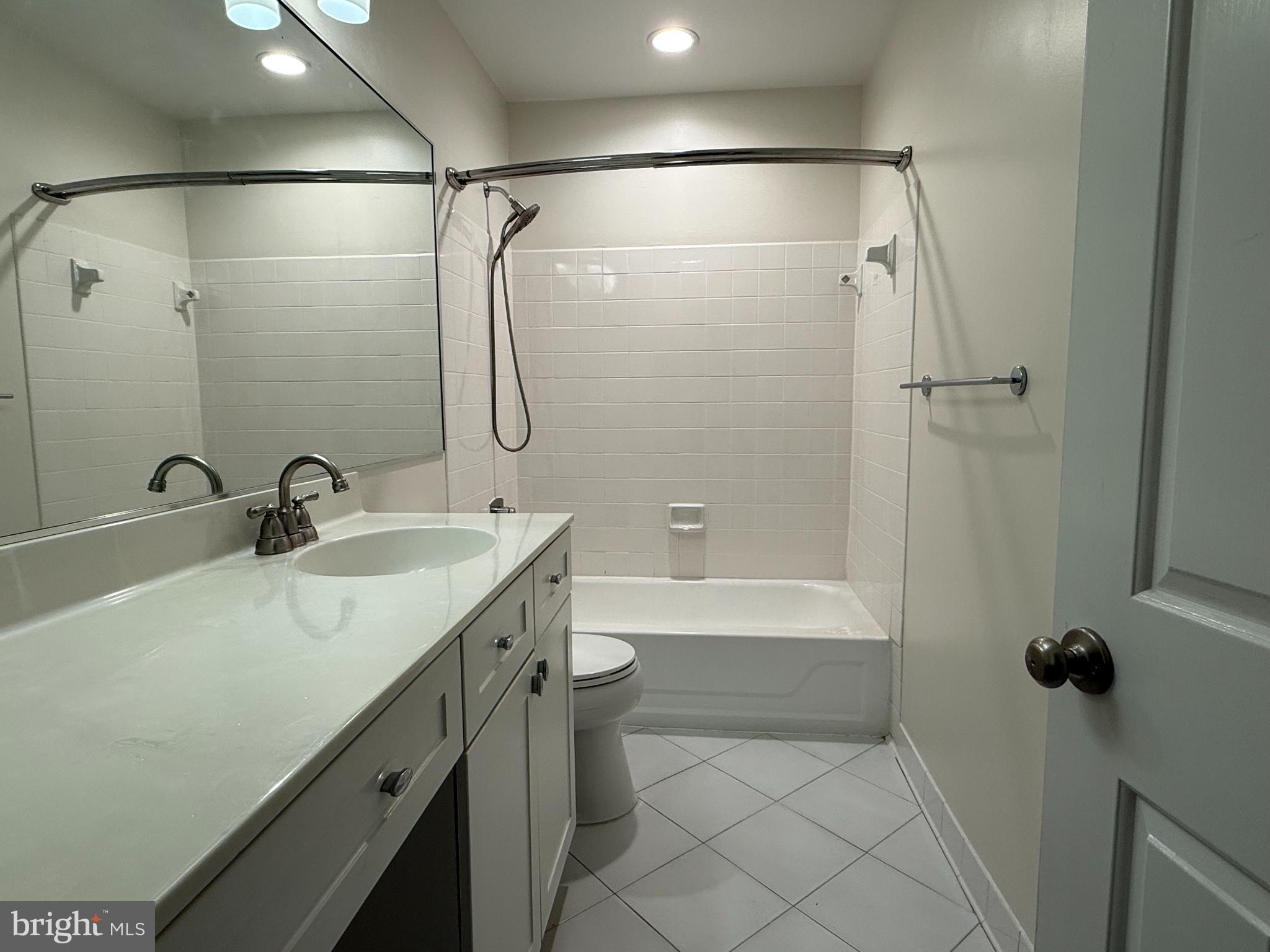 1632 Beekman Place Northwest, Unit B Washington, DC 20009 - Photo 13 of 14 Modern bathroom with sleek finishes.
