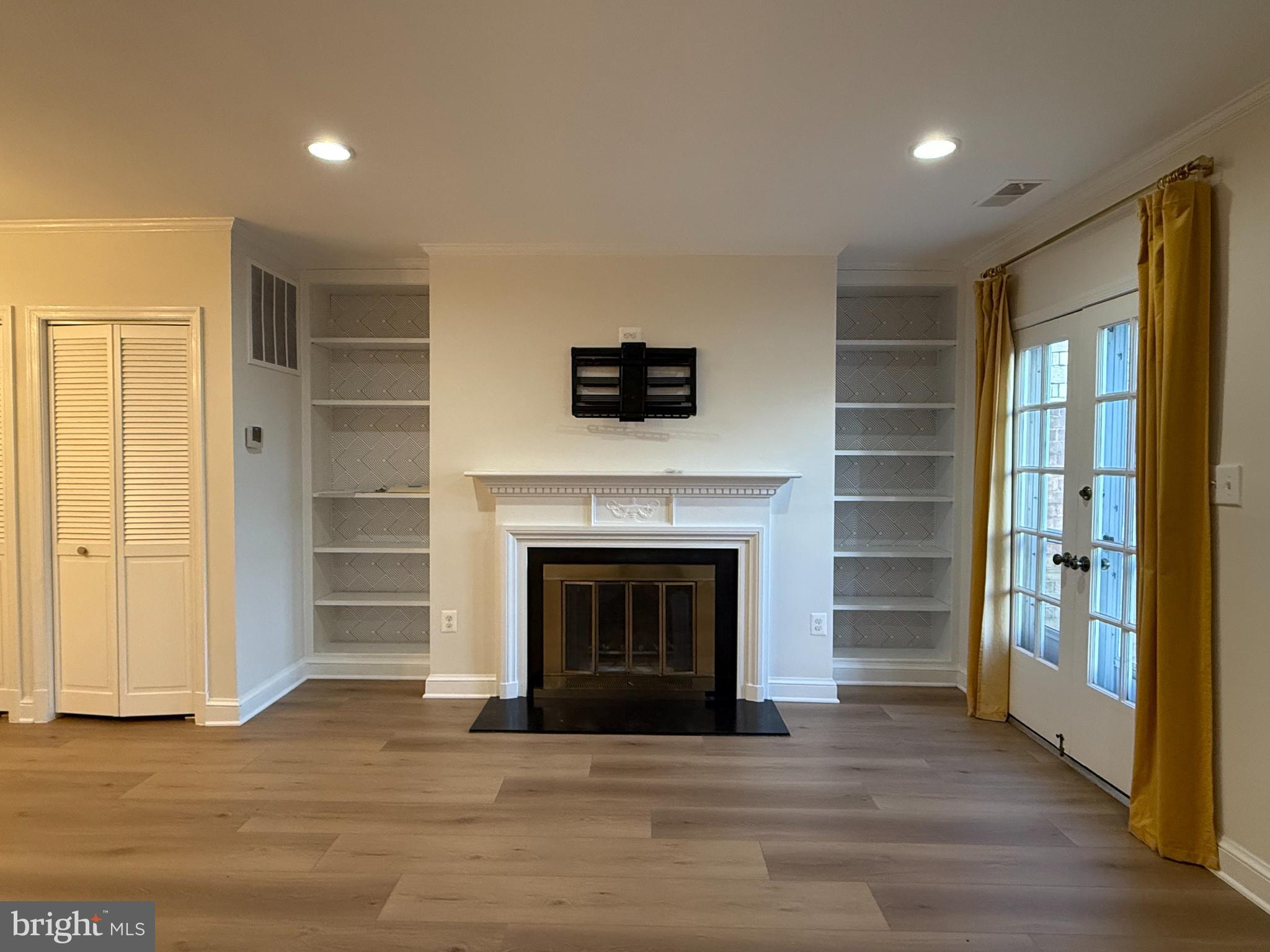 1632 Beekman Place Northwest, Unit B Washington, DC 20009 - Photo 5 of 14 Cozy living space with elegant fireplace.