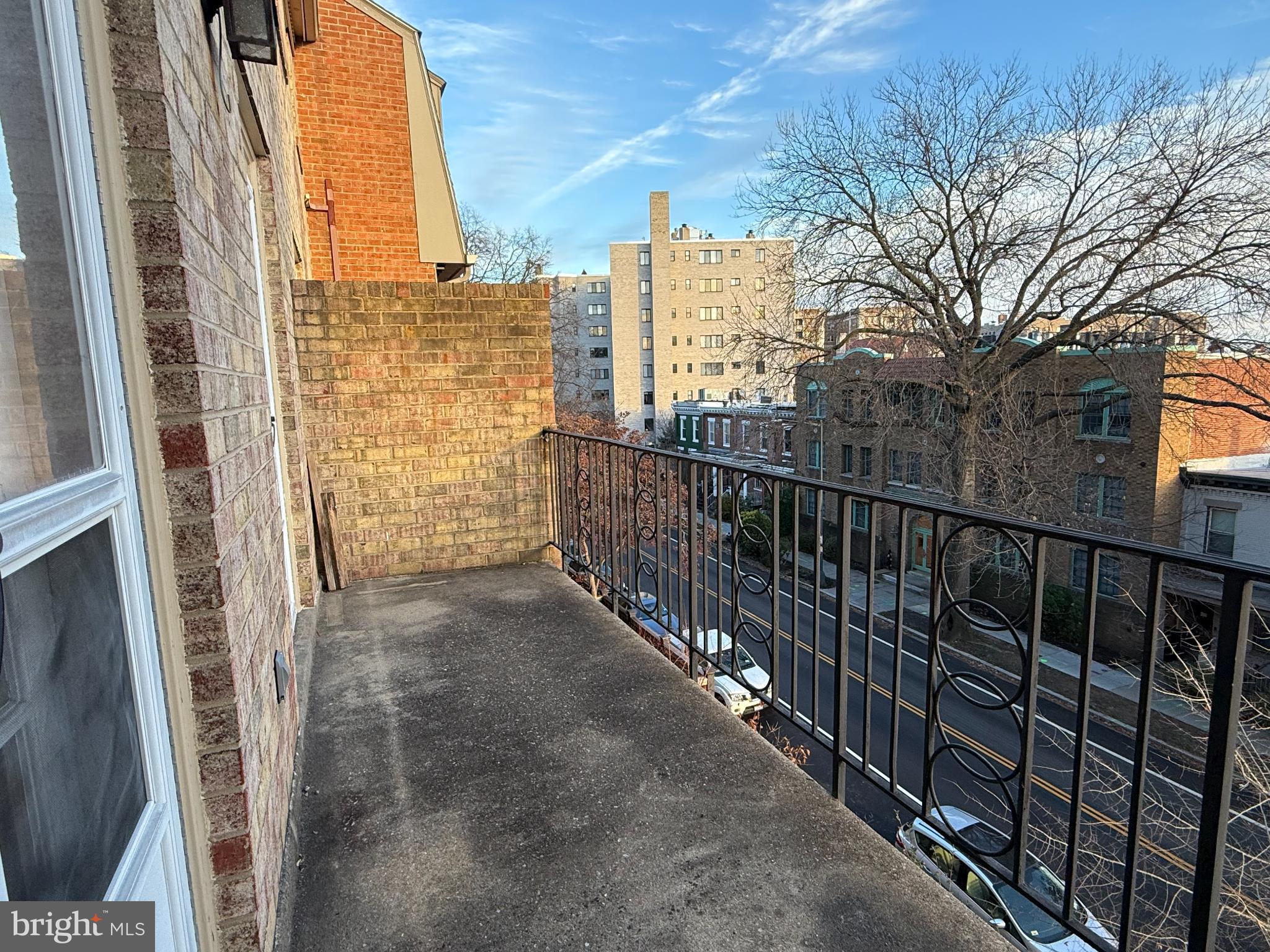 1632 Beekman Place Northwest, Unit B Washington, DC 20009 - Photo 7 of 14 Urban balcony with cityscape views.