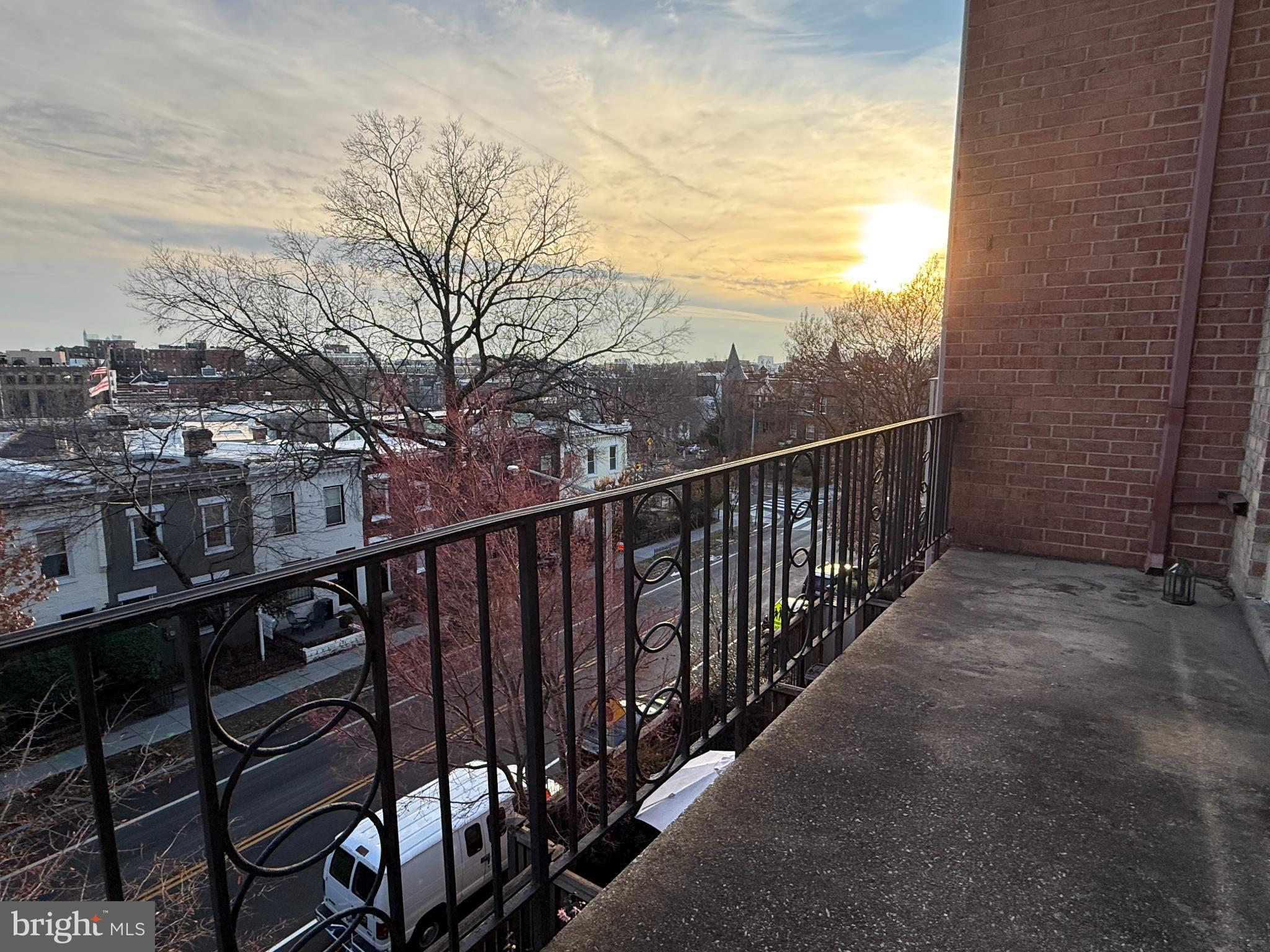 1632 Beekman Place Northwest, Unit B Washington, DC 20009 - Photo 8 of 14 Sunset view from a charming balcony.