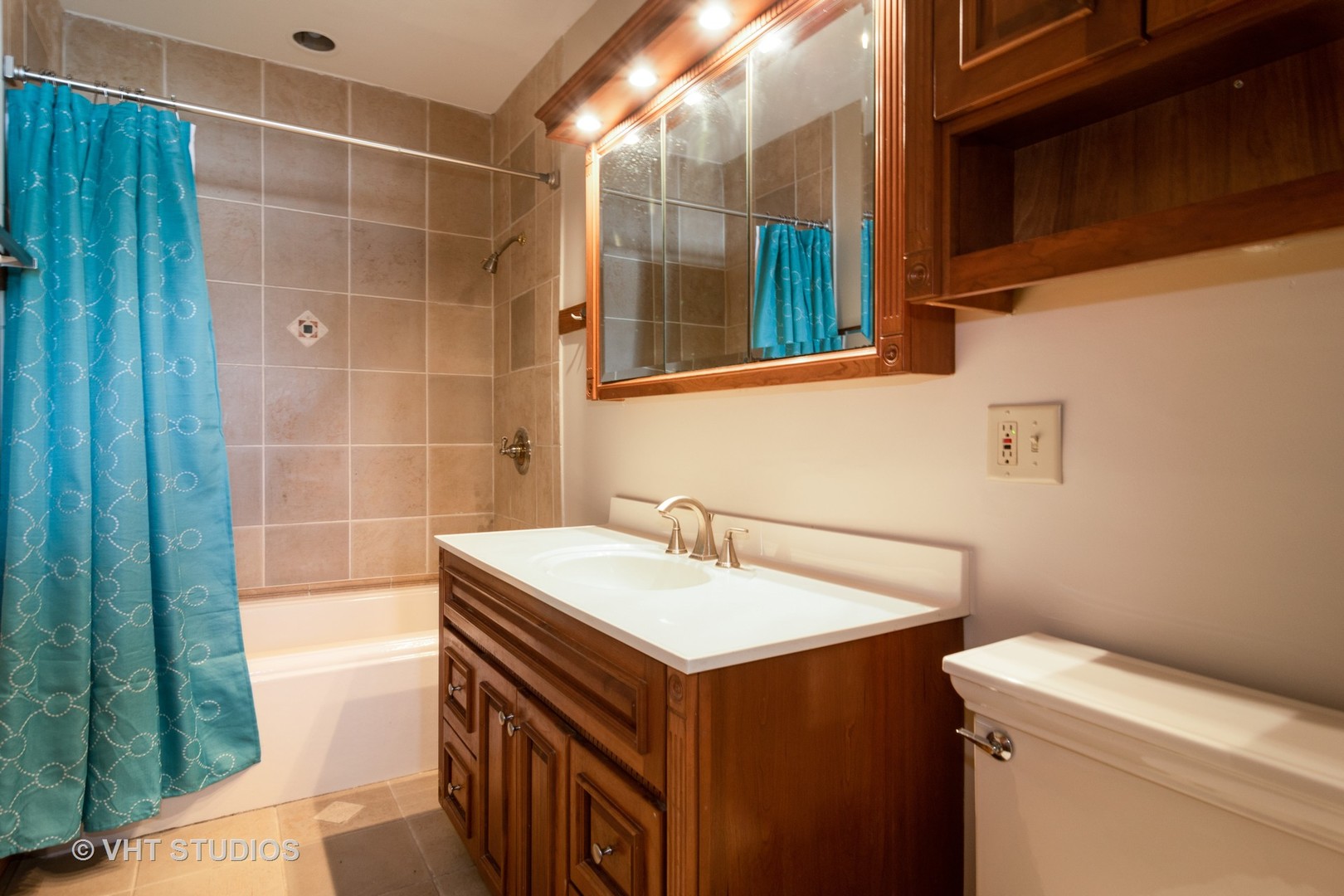 152 East Burlington Street Riverside, IL 60546 - Photo 9 of 10 a bathroom with a sink and a mirror