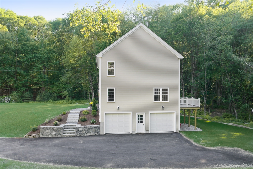 41 Martin Road Douglas, MA 01516 - Photo 37 of 40 a view of a house with a yard