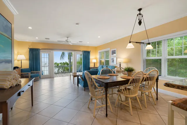 a kitchen with granite countertop a refrigerator stove and sink