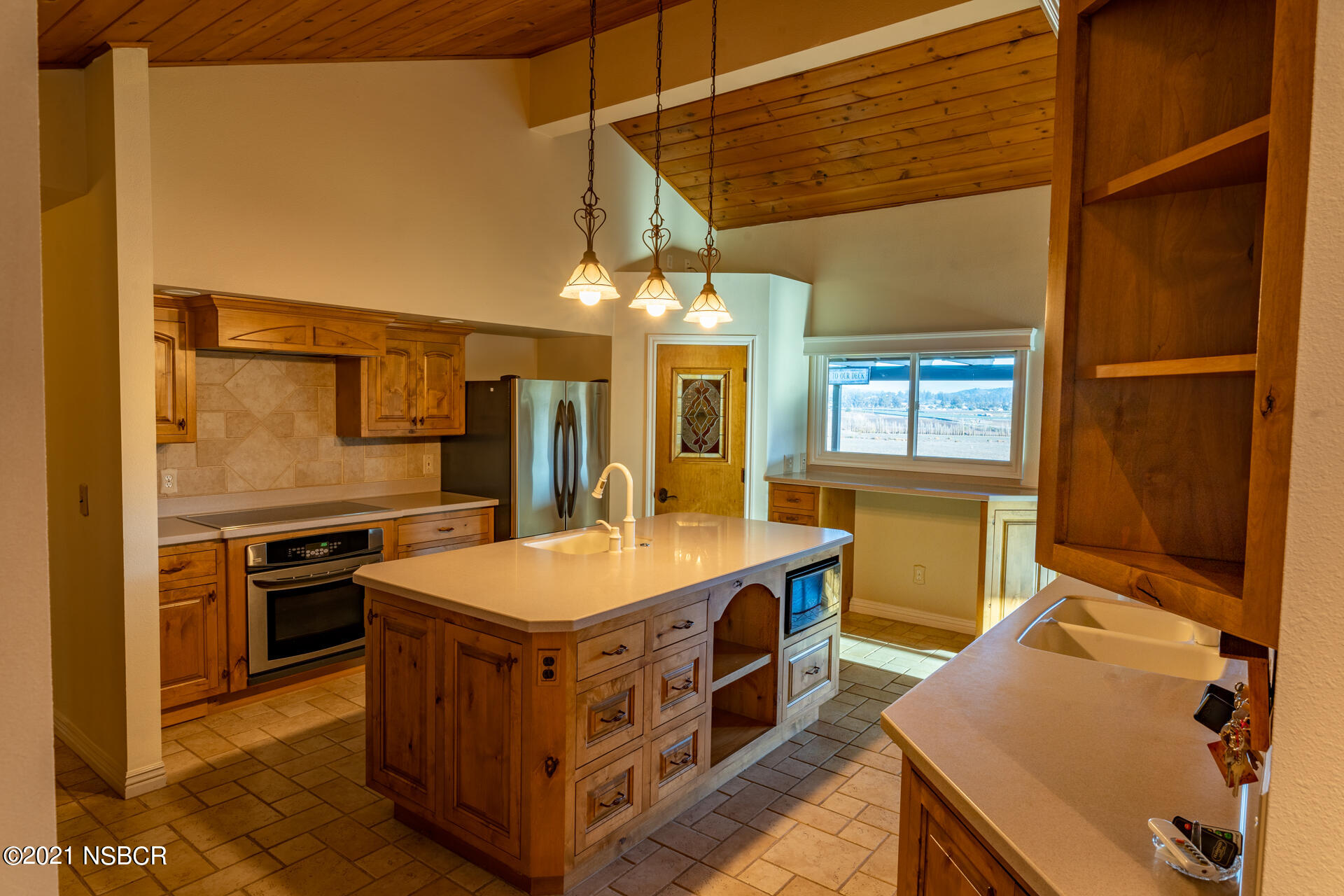 4281 Highway 246 Lompoc, CA 93436 - Photo 14 of 18 a kitchen with a stove and a refrigerator