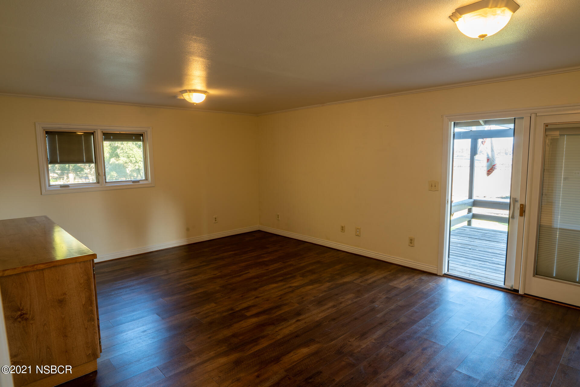4281 Highway 246 Lompoc, CA 93436 - Photo 16 of 18 a view of an empty room with wooden floor and a window