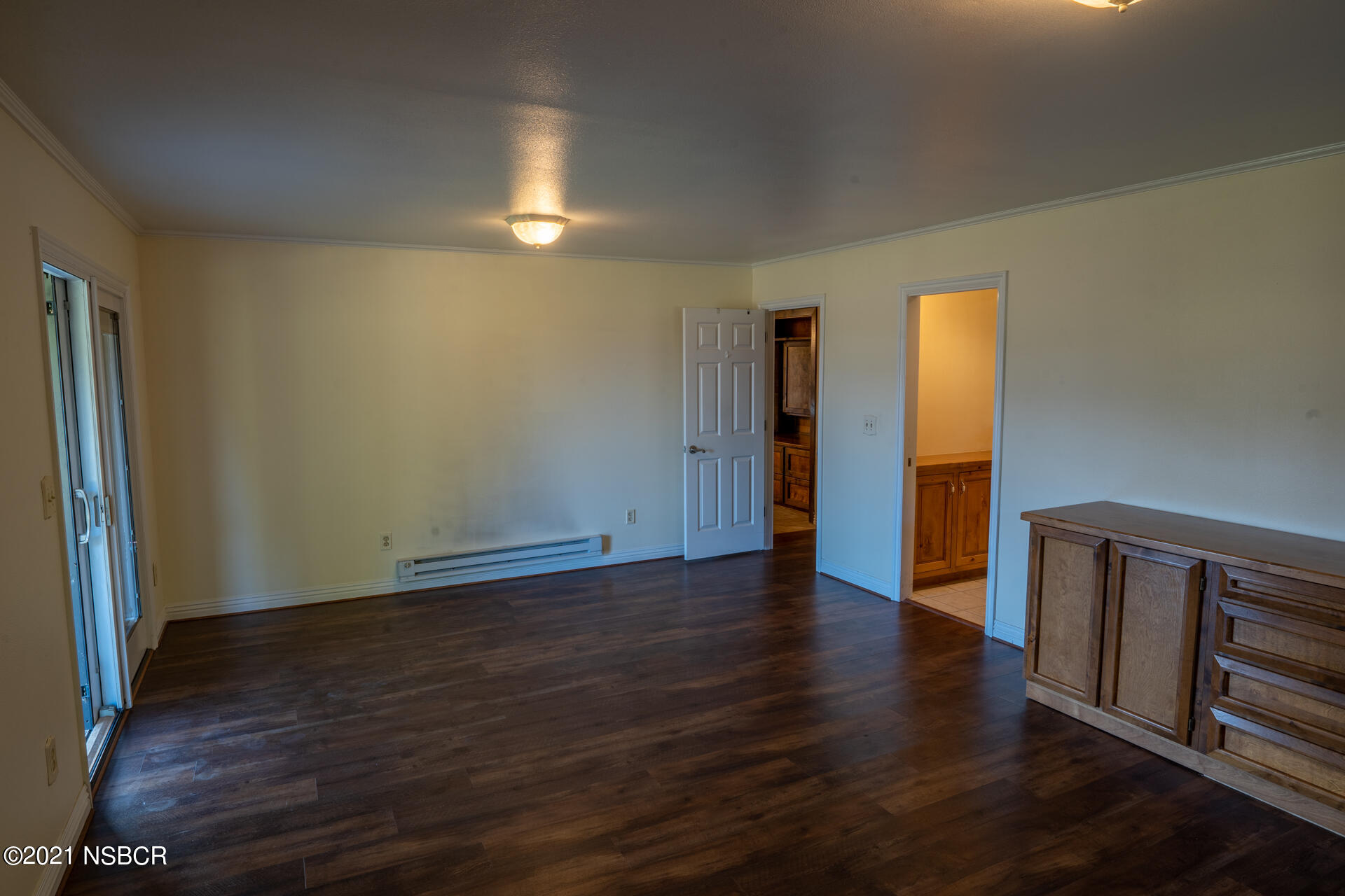 4281 Highway 246 Lompoc, CA 93436 - Photo 17 of 18 a view of an empty room with wooden floor and a window