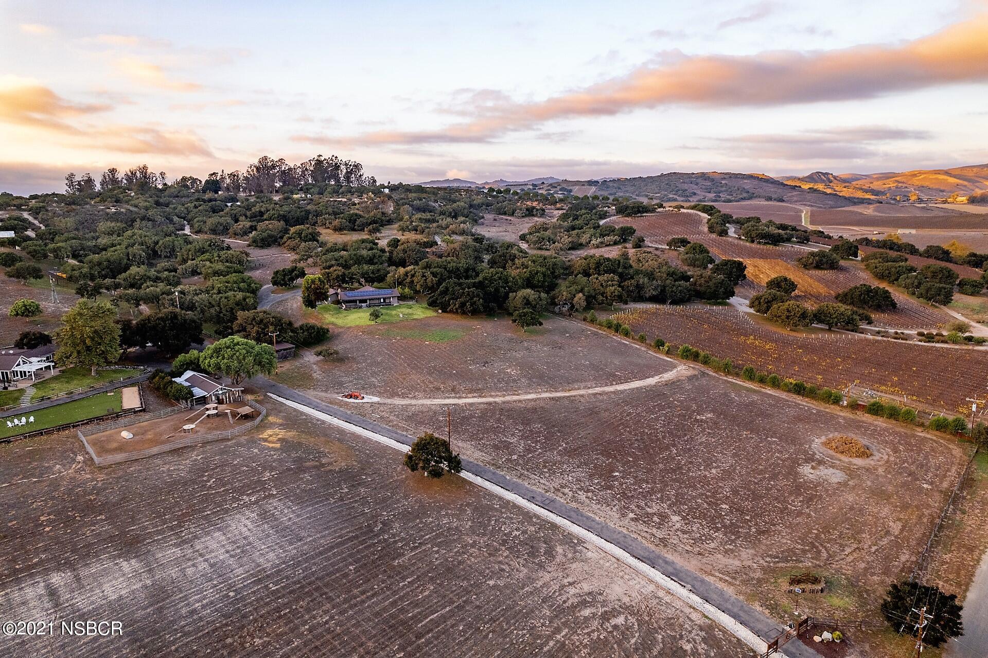 4281 Highway 246 Lompoc, CA 93436 - Photo 3 of 18 a view of a dry yard with wooden fence