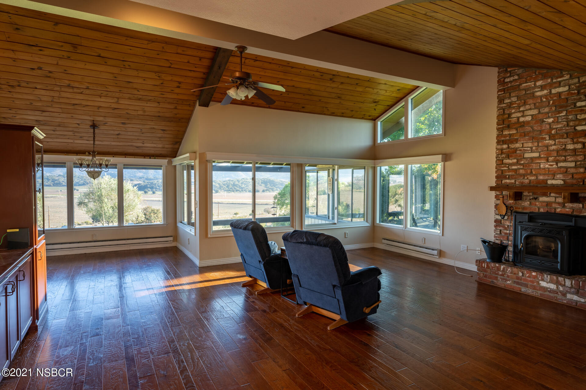 4281 Highway 246 Lompoc, CA 93436 - Photo 10 of 18 a living room with furniture and a fireplace