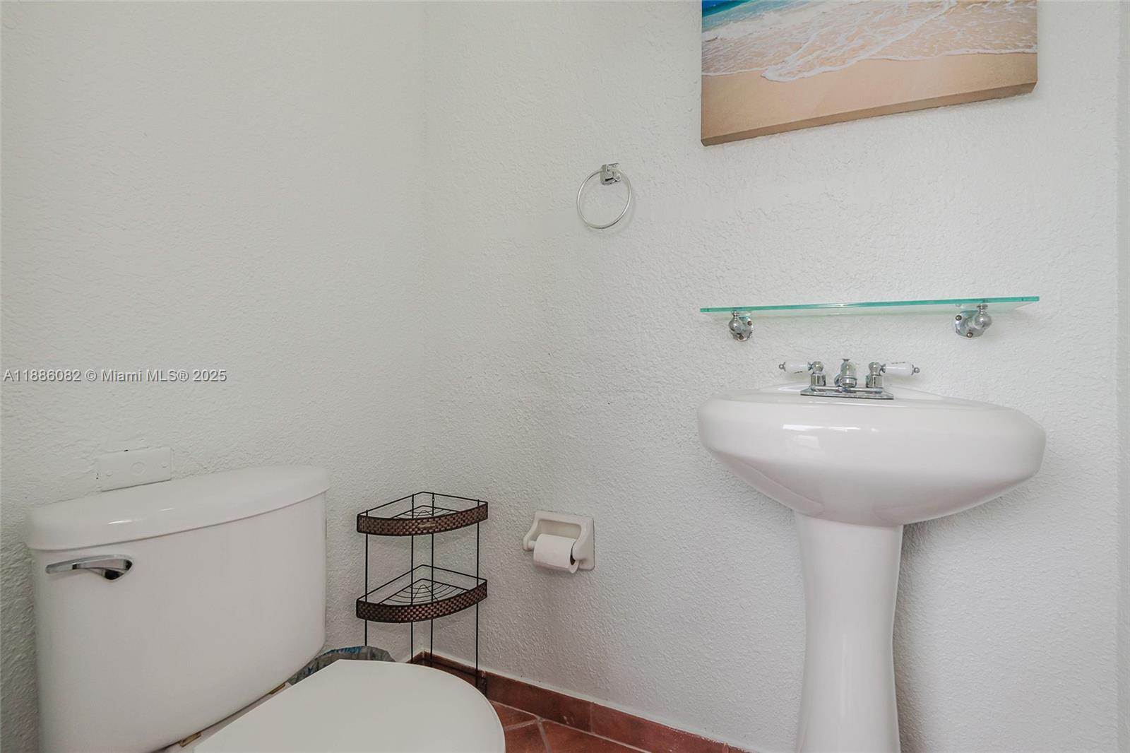 2911 Southwest 149th Place Miami, FL 33185 - Photo 31 of 33 a bathroom with a sink mirror and toilet