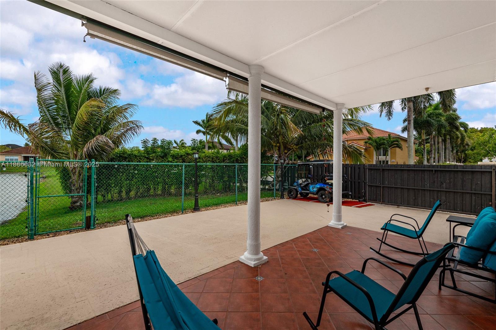 2911 Southwest 149th Place Miami, FL 33185 - Photo 4 of 33 a view of a patio with a yard