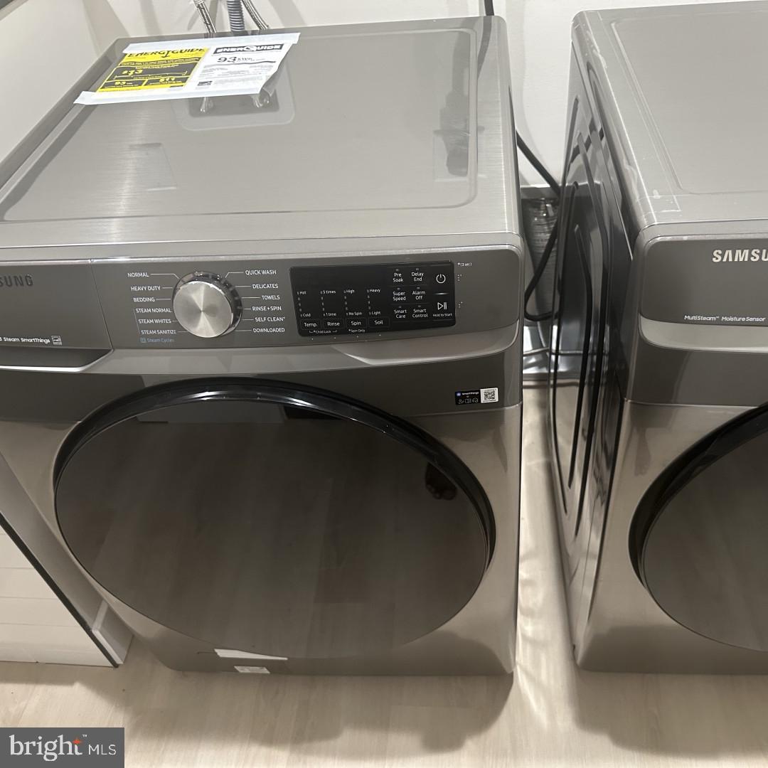 6931 River Drive Road Sparrows Point, MD 21219 - Photo 27 of 54 Sleek modern laundry appliances.