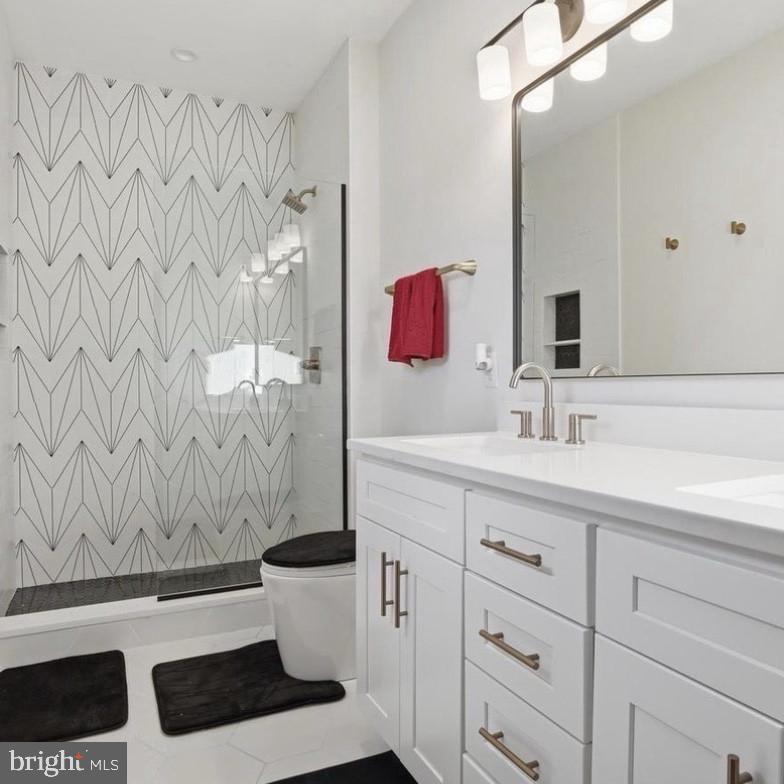6931 River Drive Road Sparrows Point, MD 21219 - Photo 36 of 54 Sleek modern bathroom with elegant design.
