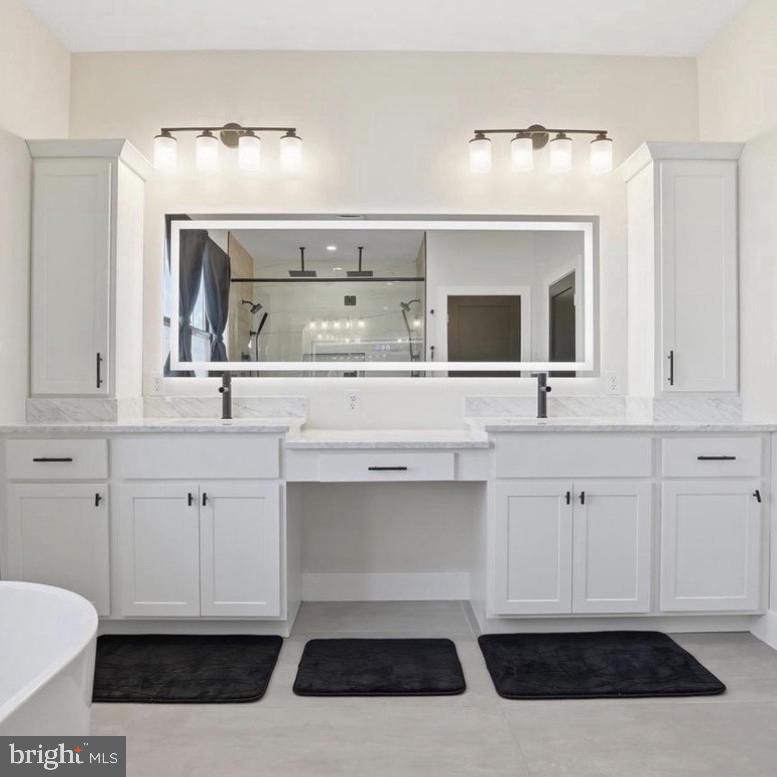 6931 River Drive Road Sparrows Point, MD 21219 - Photo 49 of 54 Sleek modern bathroom with elegant fixtures.