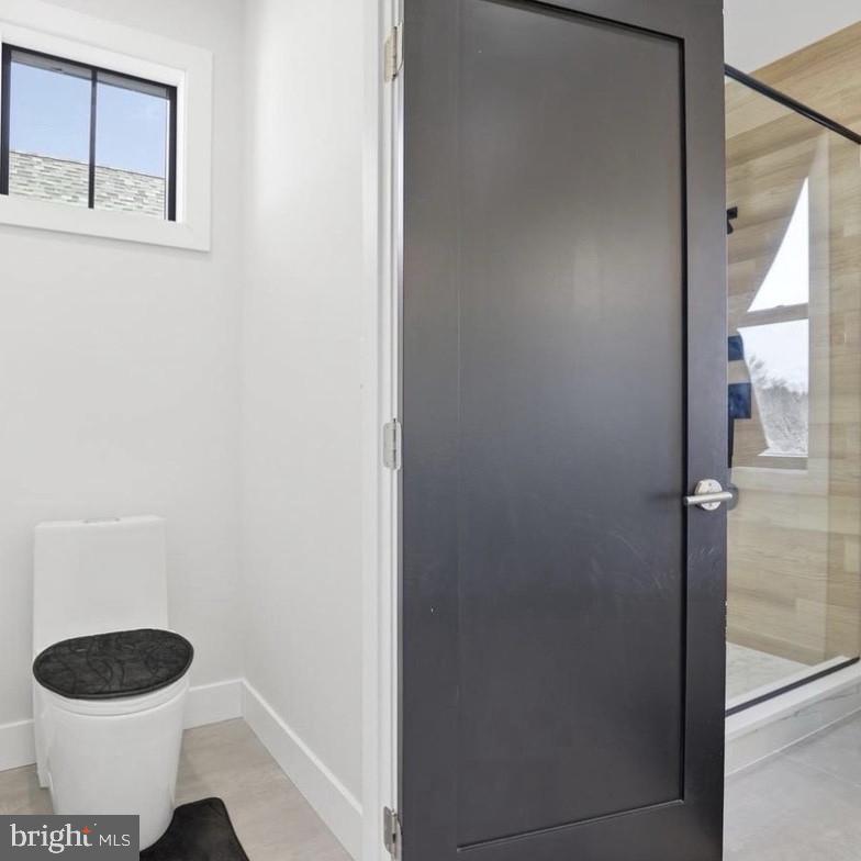 6931 River Drive Road Sparrows Point, MD 21219 - Photo 50 of 54 Sleek modern bathroom design.