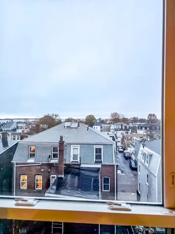 a view of a lake with a building in the background