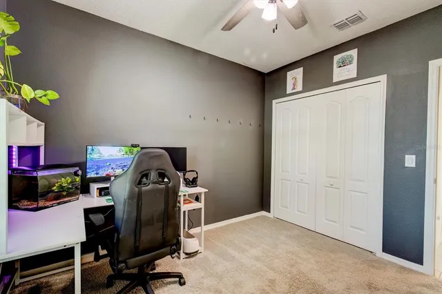 a view of a workspace with furniture