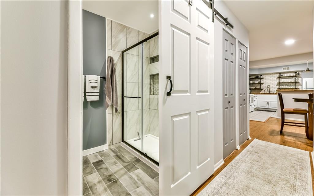 553 Sloop Road, Unit 38 Pittsburgh, PA 15237 - Photo 11 of 22 Spectacular new Bath with new ceramic floor and beautiful glass enclosed shower! New Barn Door with locking mechanism!