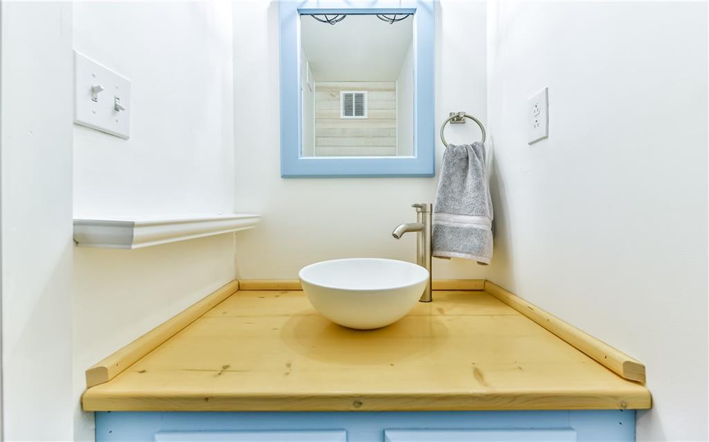 553 Sloop Road, Unit 38 Pittsburgh, PA 15237 - Photo 16 of 22 Master Bedroom half bath has been updated with a vessel sink and white washed barn wood planks!