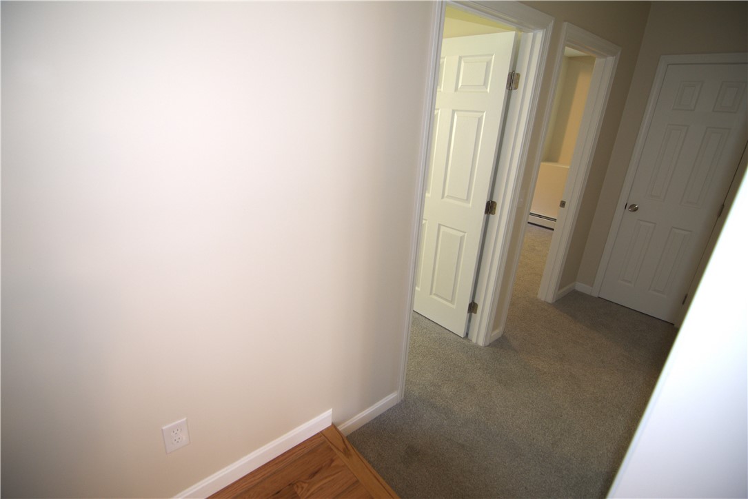 304 Getchell Avenue Woonsocket, RI 02895 - Photo 16 of 27 Hall to 3 additional bedrooms