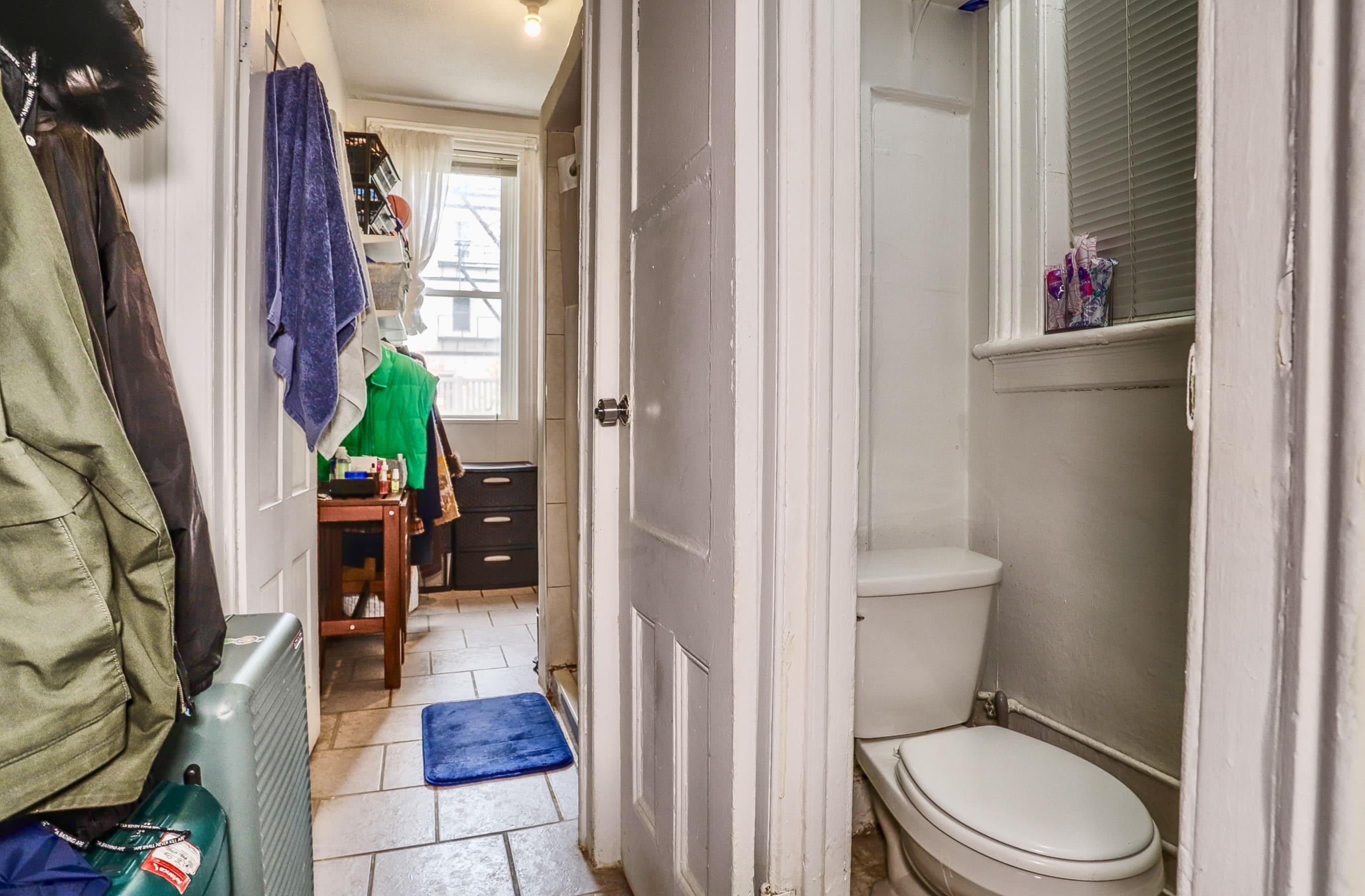 521 Willow Avenue, Unit 1R Hoboken, NJ 07030 - Photo 11 of 15 a bathroom with a toilet and a shower