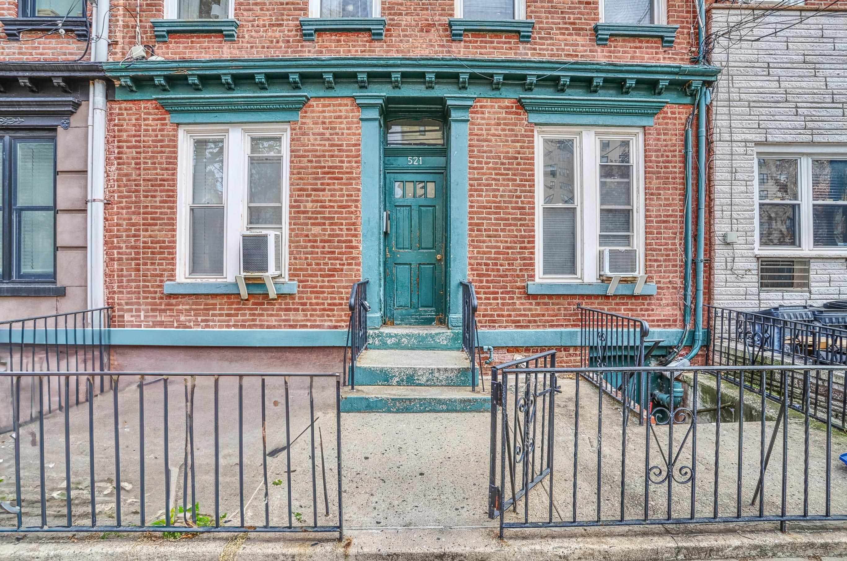 521 Willow Avenue, Unit 1R Hoboken, NJ 07030 - Photo 13 of 15 a front view of a house with a glass windows