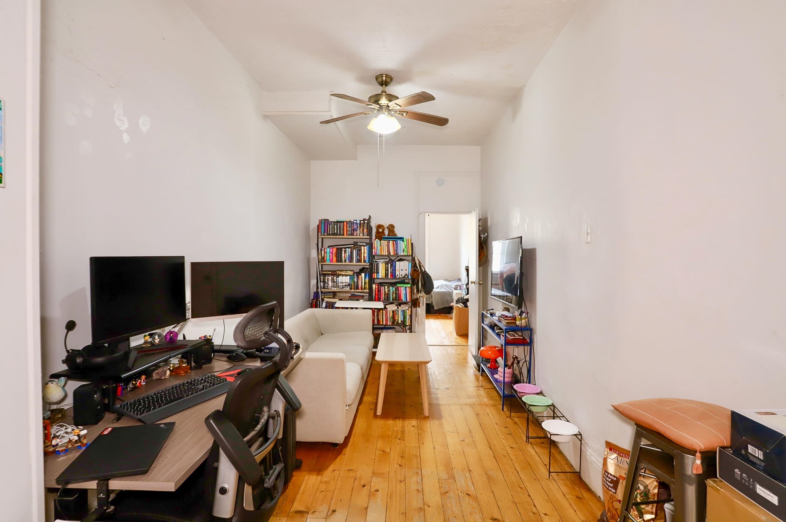 521 Willow Avenue, Unit 1R Hoboken, NJ 07030 - Photo 5 of 15 a view of a workspace with furniture and wooden floor