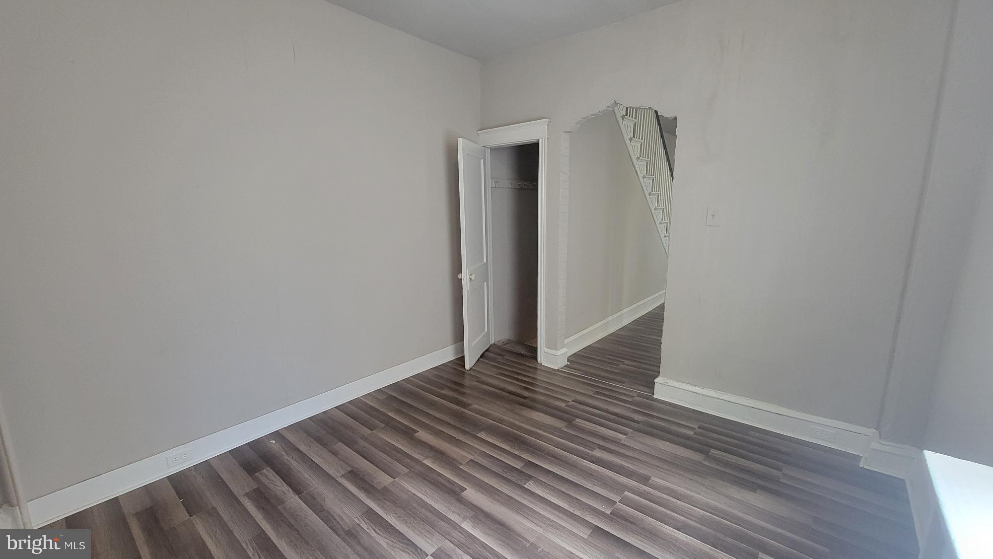 3208 D Street Philadelphia, PA 19134 - Photo 13 of 33 a view of an empty room with wooden floor and closet