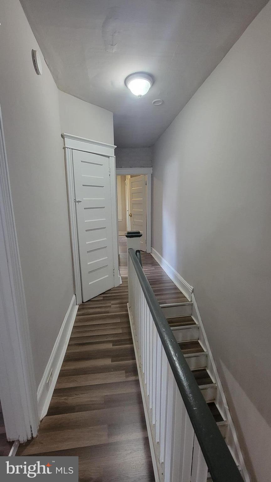 3208 D Street Philadelphia, PA 19134 - Photo 17 of 33 a view of a hallway with wooden floor and staircase