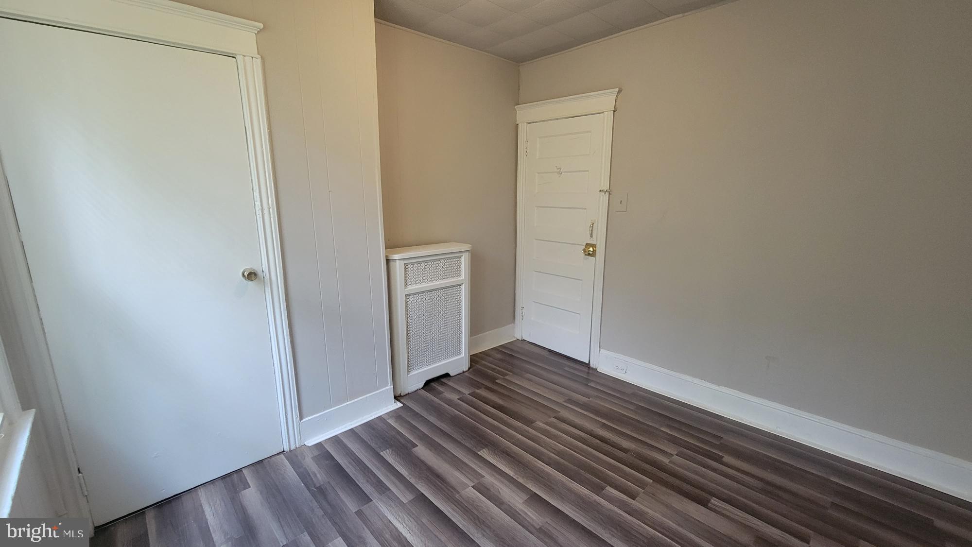 3208 D Street Philadelphia, PA 19134 - Photo 19 of 33 a view of an empty room with wooden floor